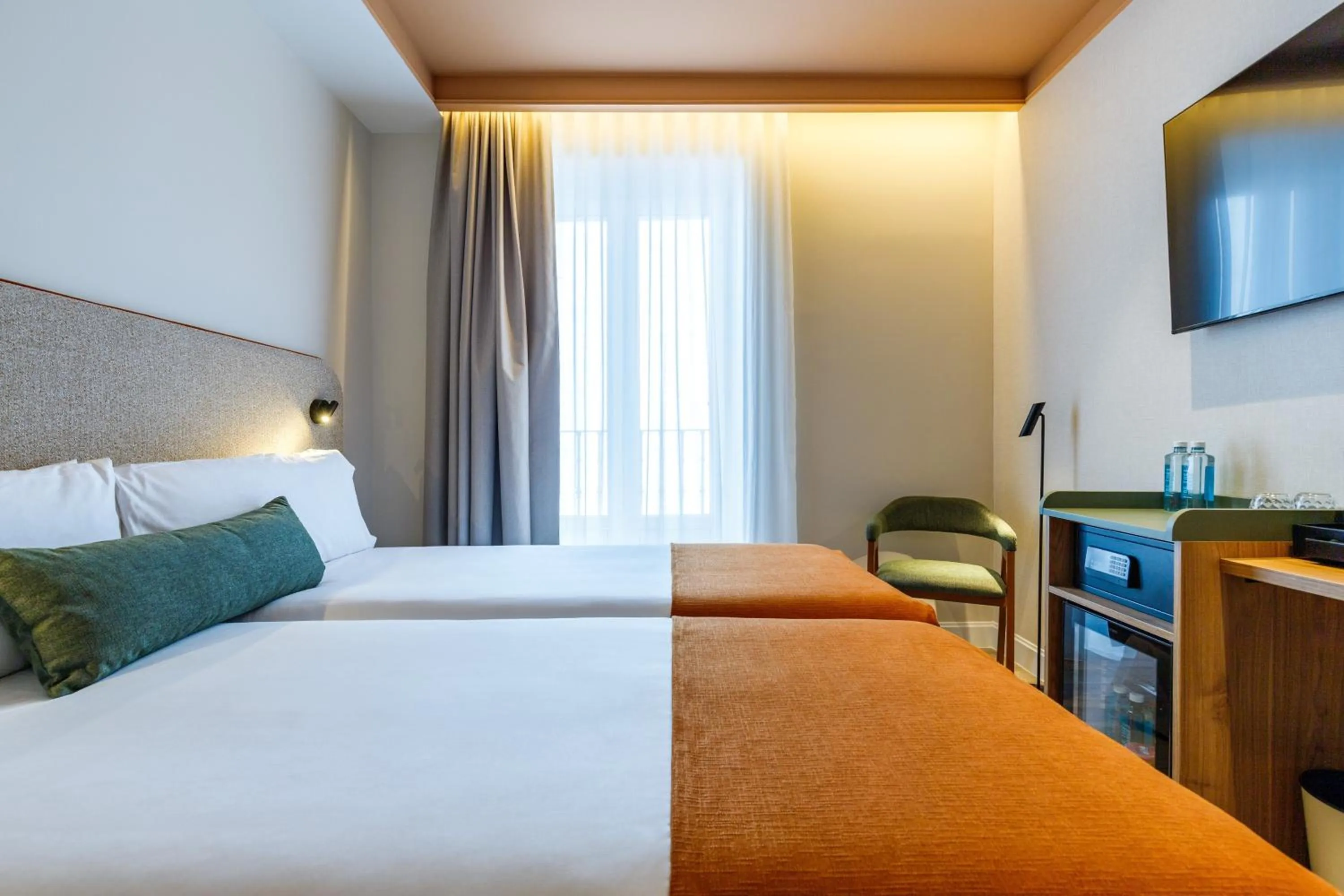 Bed in Petit Palace Puerta del Sol