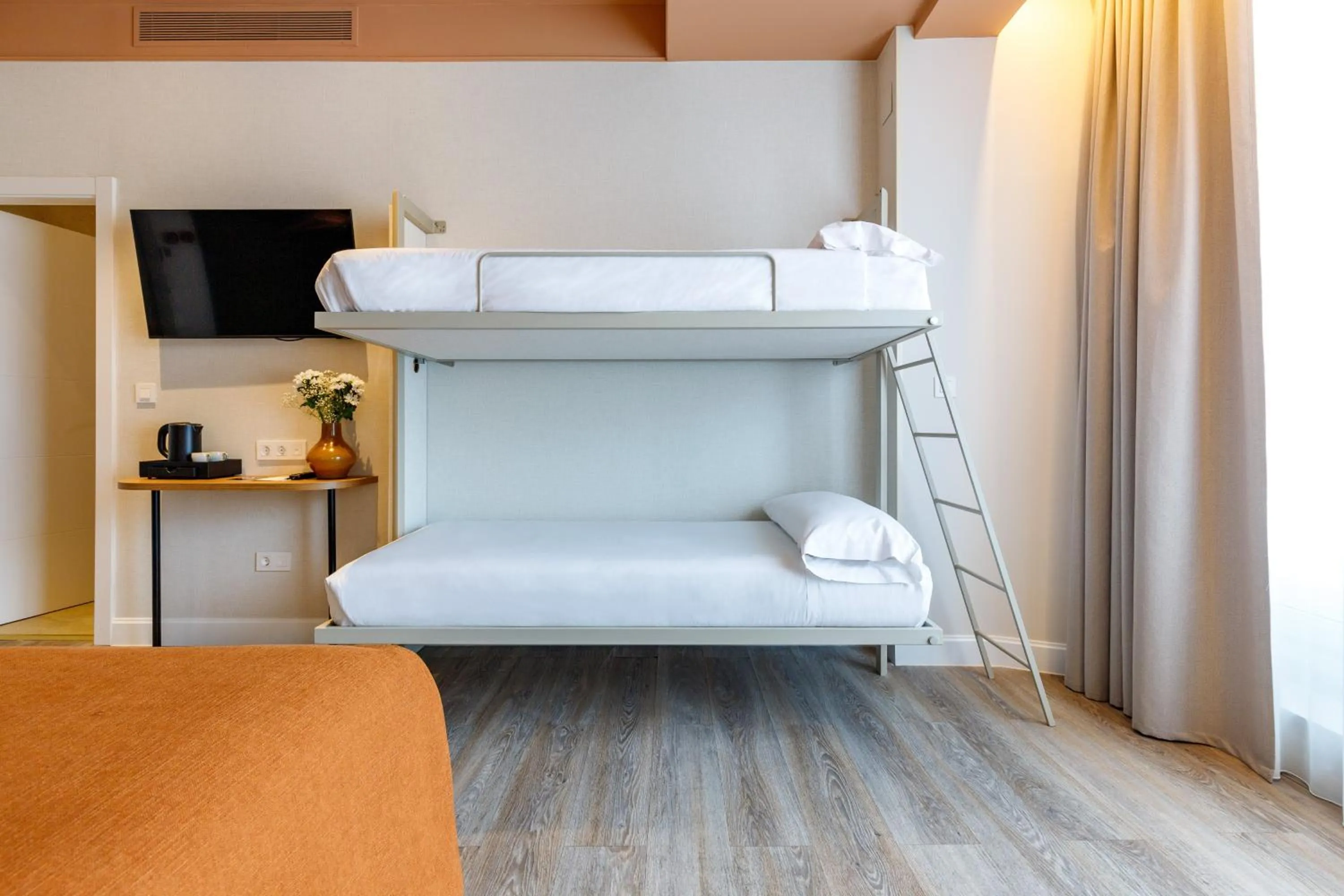 Bed in Petit Palace Puerta del Sol