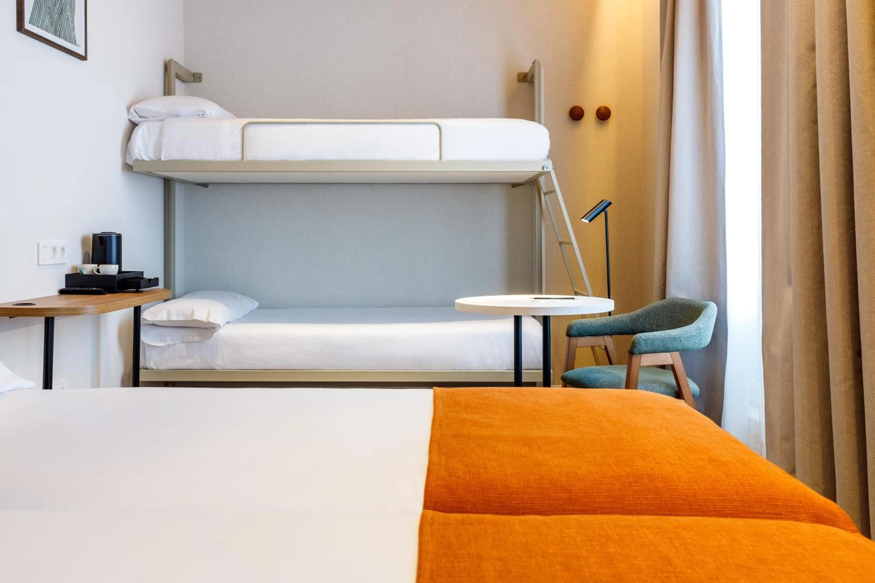 Bed in Petit Palace Puerta del Sol