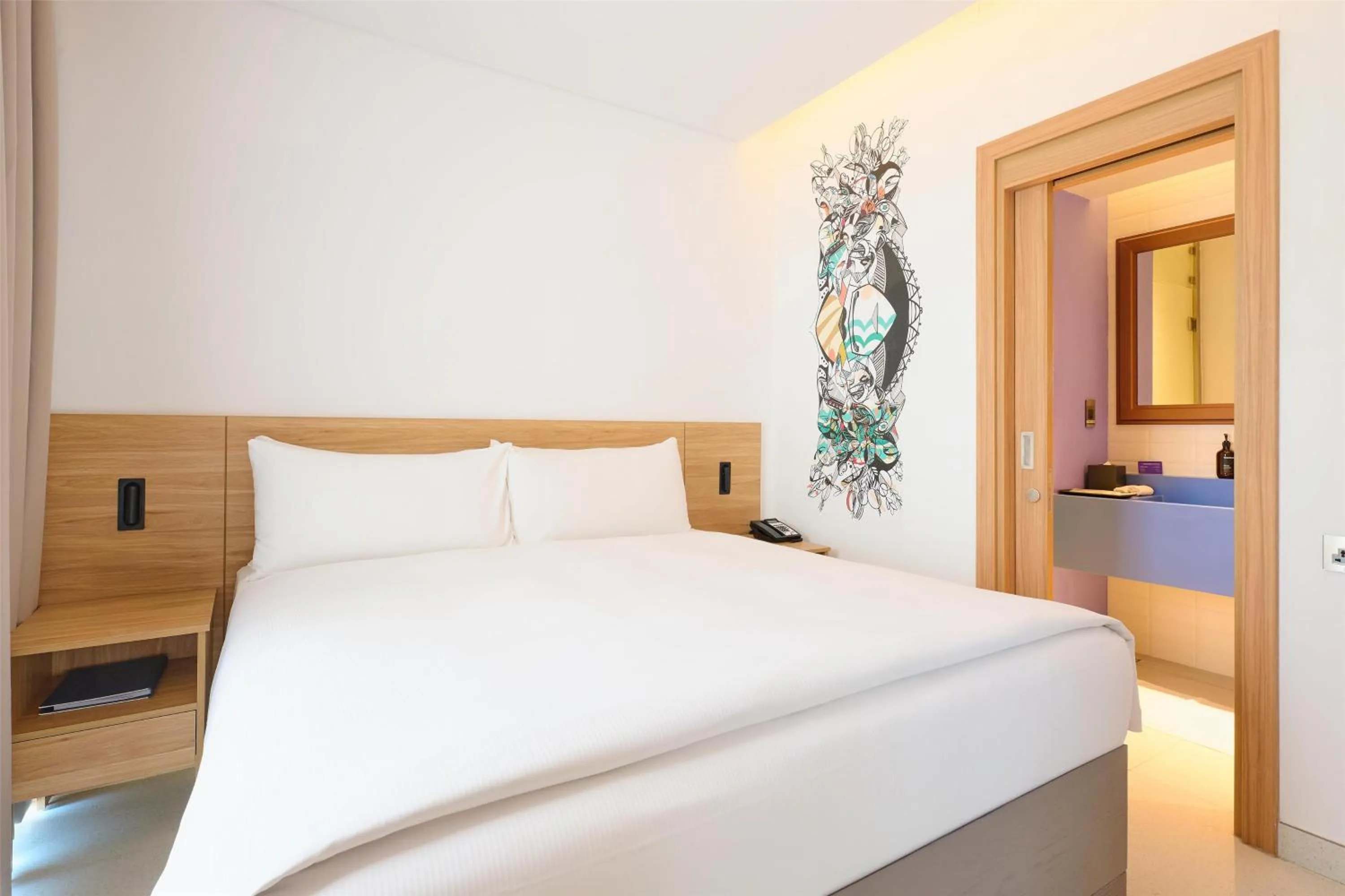 Bed in Fuwairit Kite Beach, Tapestry Collection By Hilton