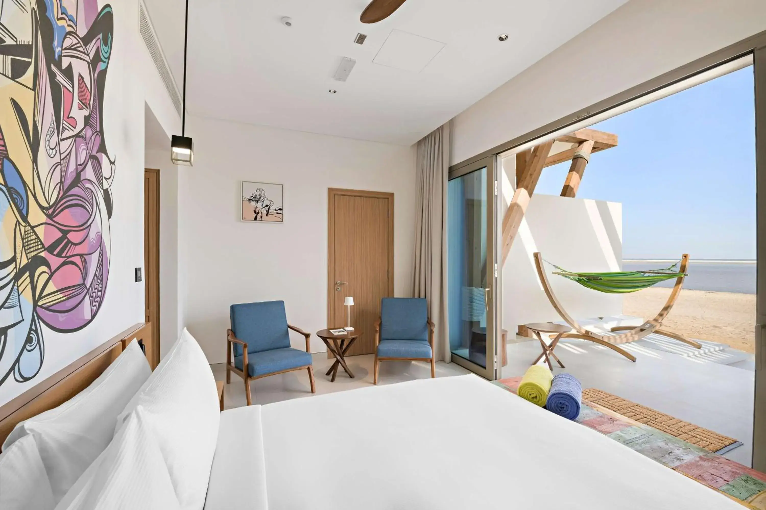 Living room, Bed in Fuwairit Kite Beach, Tapestry Collection By Hilton Living room, Bed in Fuwairit Kite Beach, Tapestry Collection By Hilton