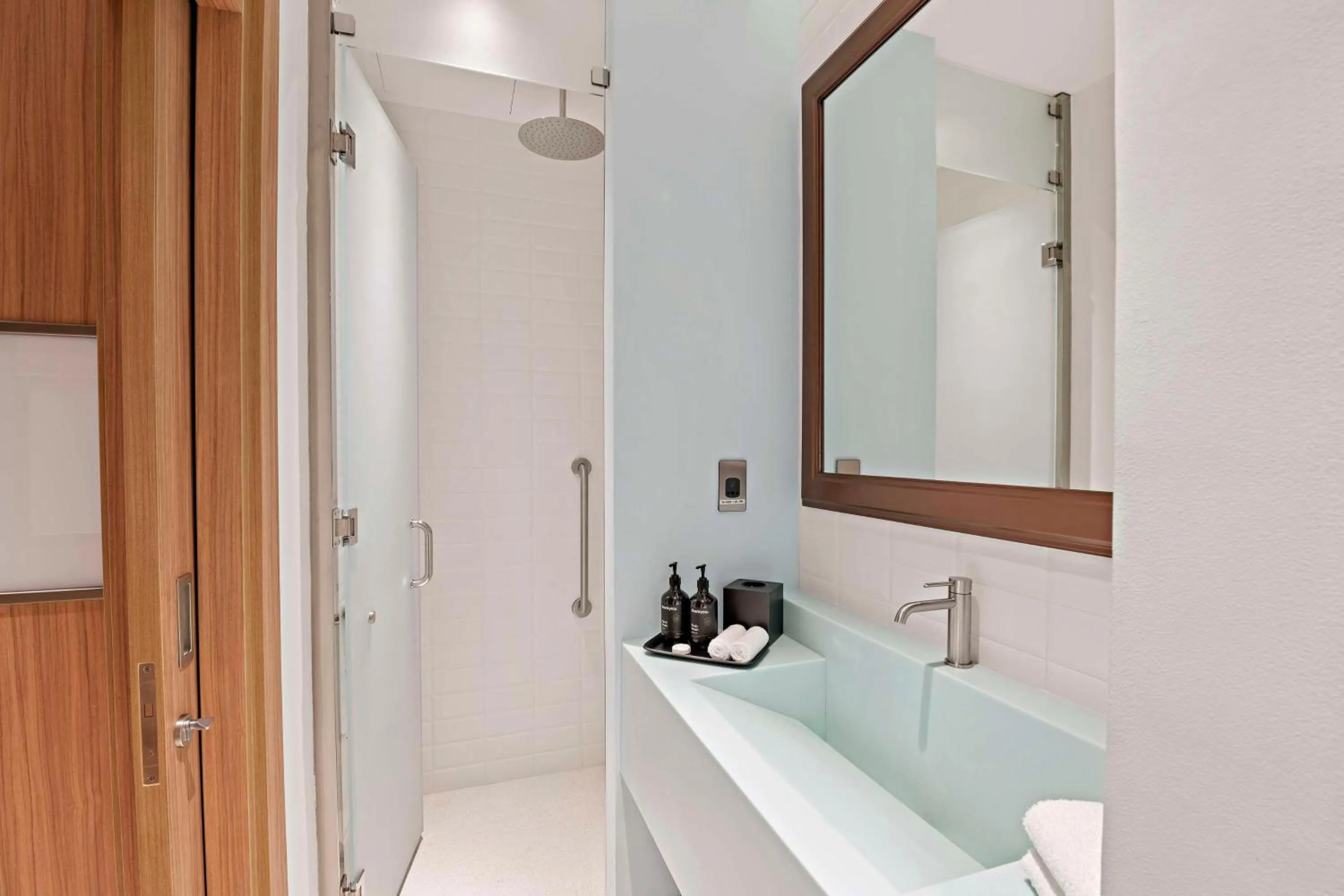 Bathroom in Fuwairit Kite Beach, Tapestry Collection By Hilton