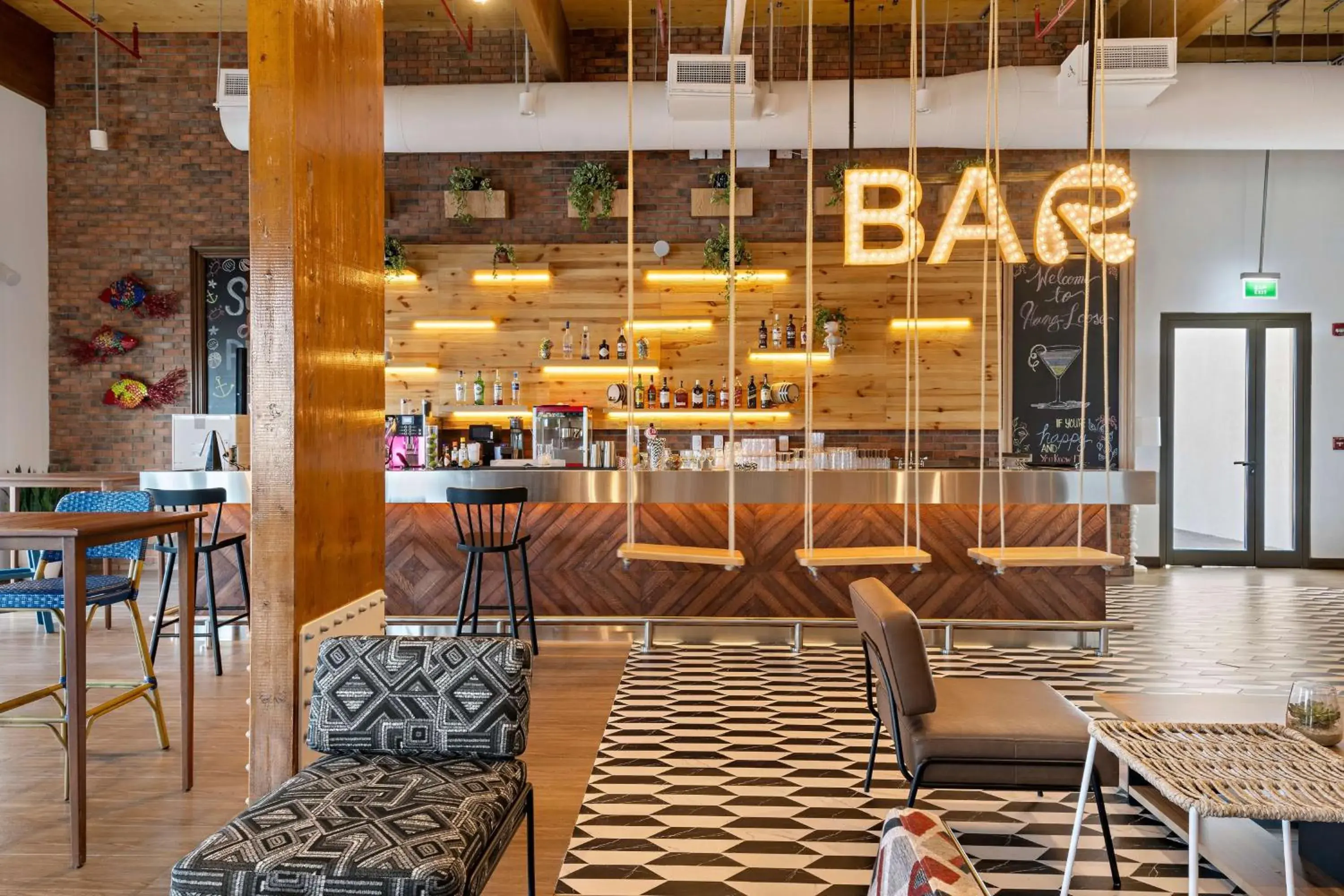 Lounge or bar in Fuwairit Kite Beach, Tapestry Collection By Hilton Lounge or bar in Fuwairit Kite Beach, Tapestry Collection By Hilton