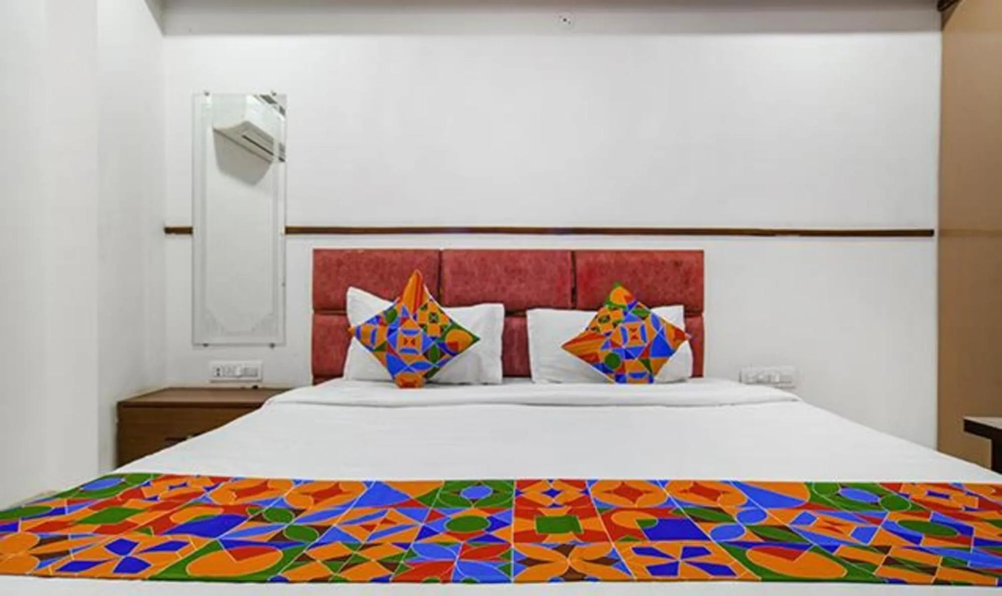 Bed in FabHotel Elite Residency