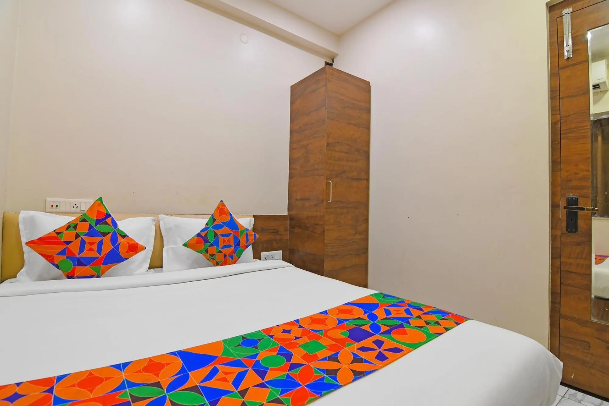 Bed in FabHotel Dak Plaza - Nr Axis Mall