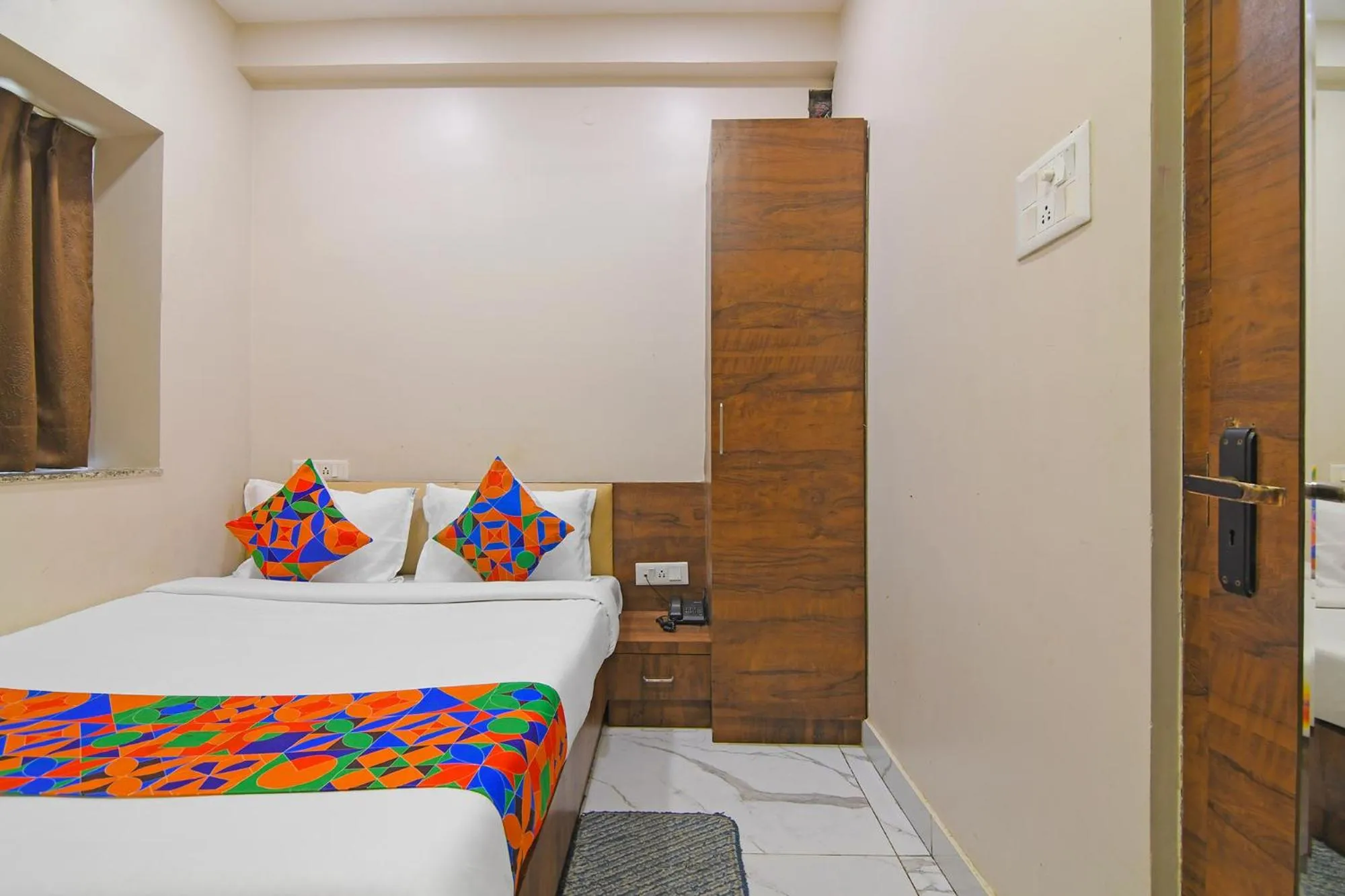 Bed in FabHotel Dak Plaza - Nr Axis Mall