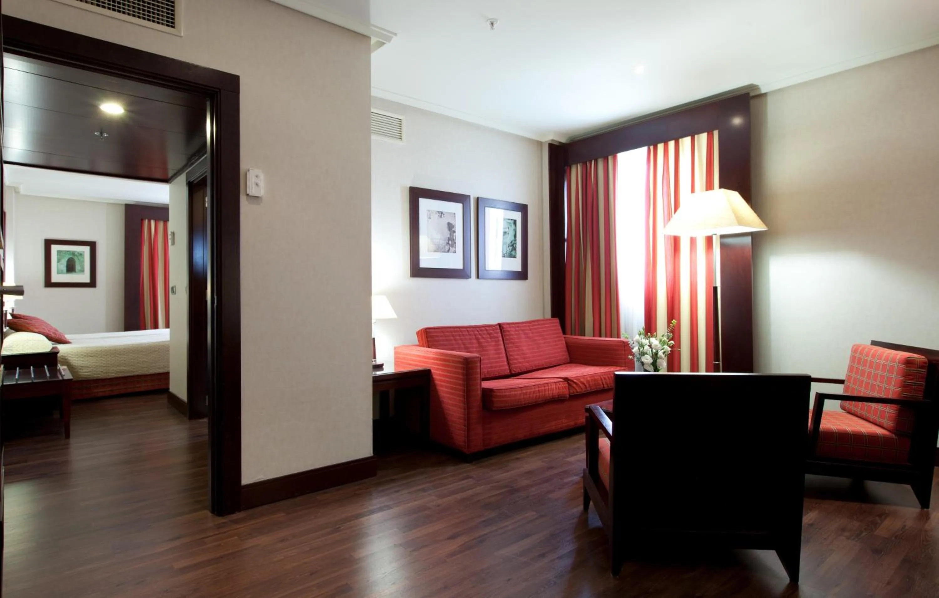 Living room, Bed in Hotel Sevilla Center