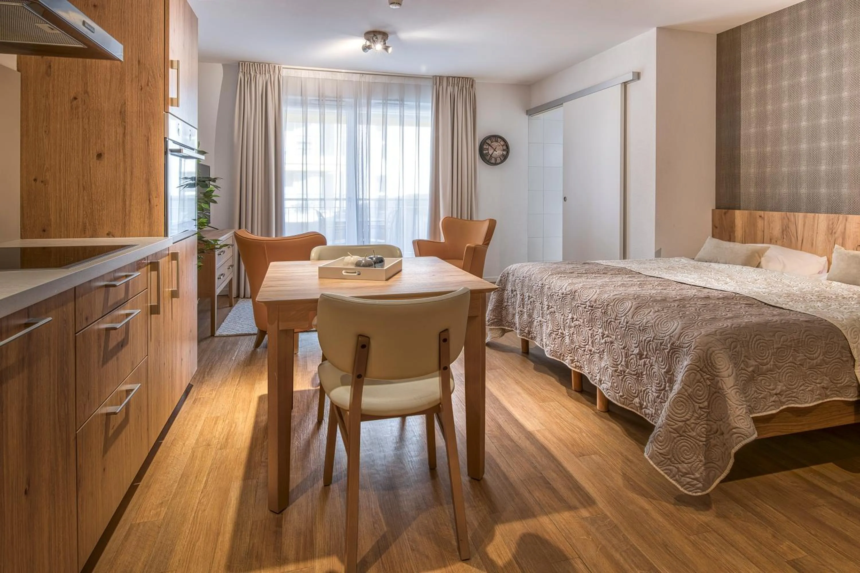 Kitchen or kitchenette, Bed in Alp Art Hotel Monthey