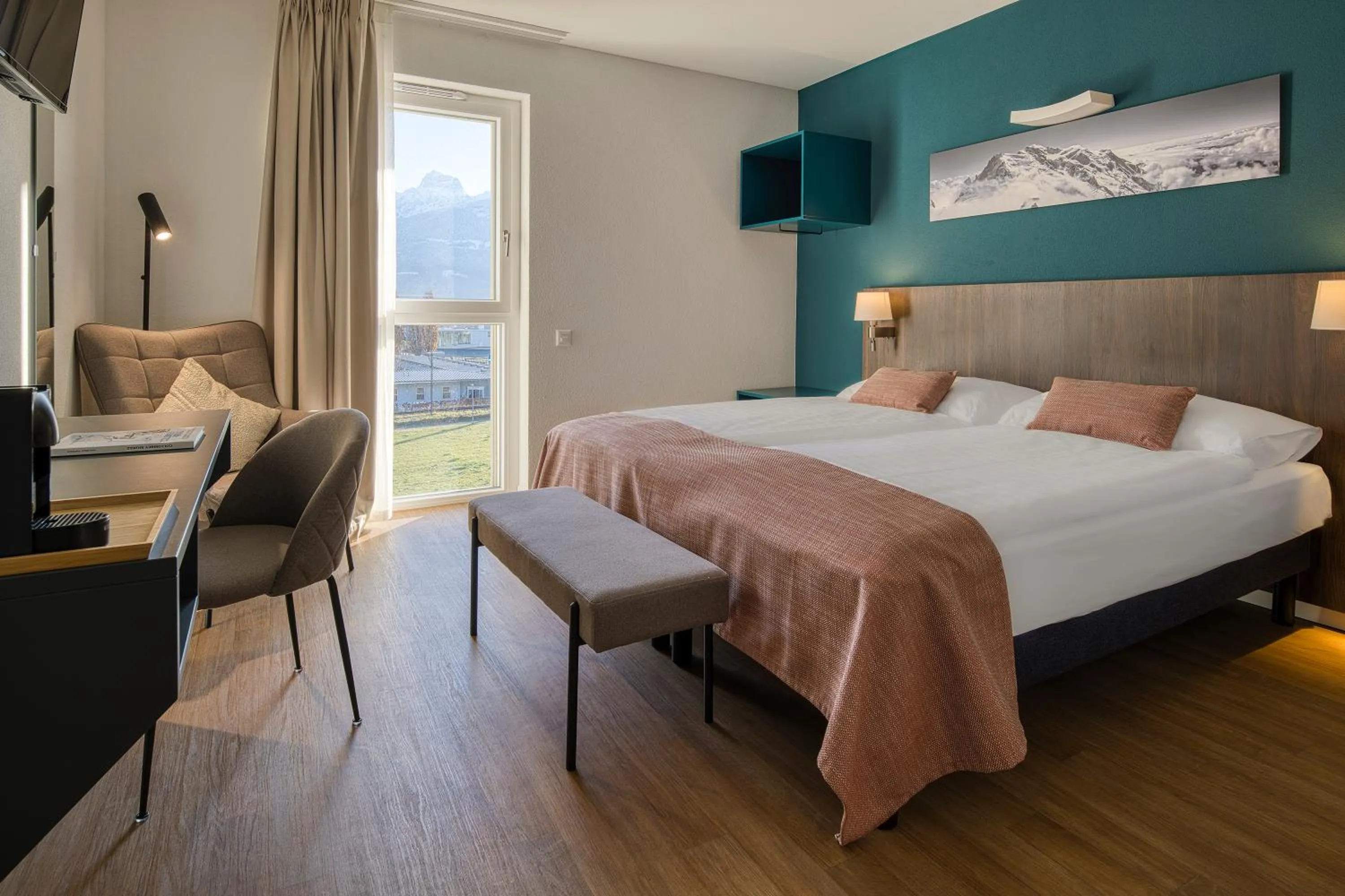 Photo of the whole room, Bed in Alp Art Hotel Monthey