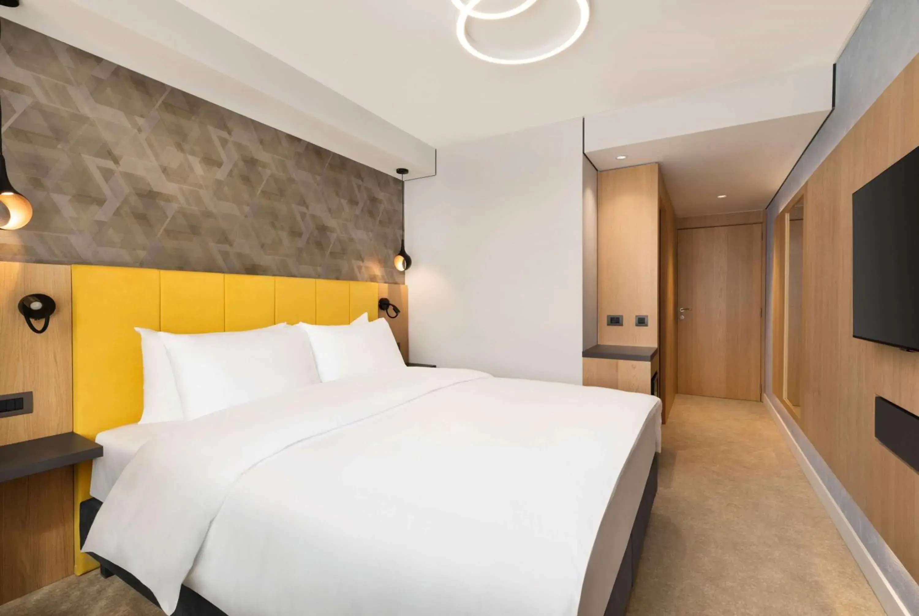 Bed in Ramada by Wyndham Slatina Parc Bed in Ramada by Wyndham Slatina Parc