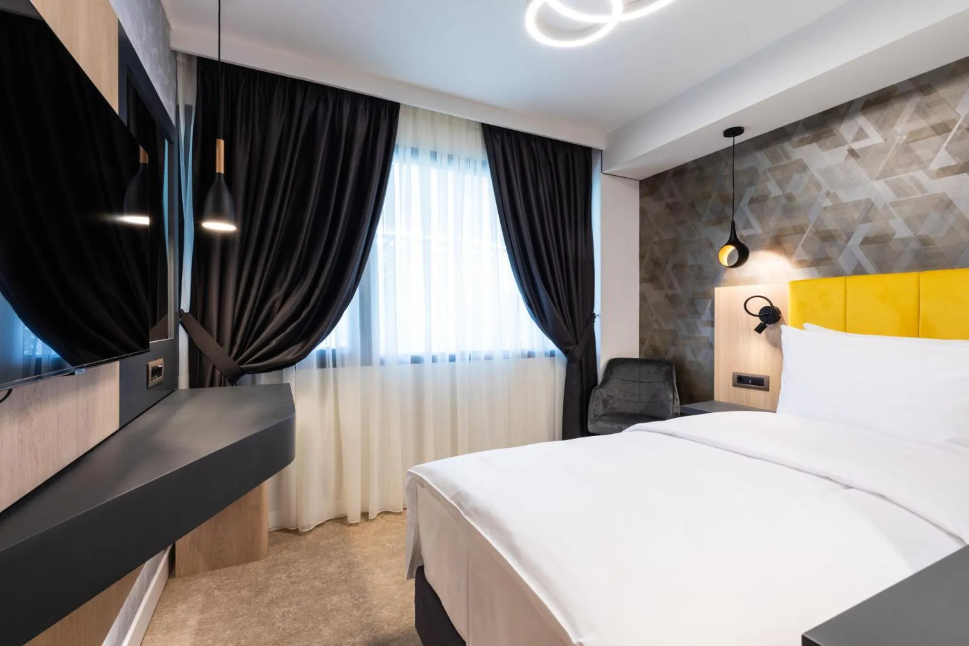 Photo of the whole room, Bed in Ramada by Wyndham Slatina Parc