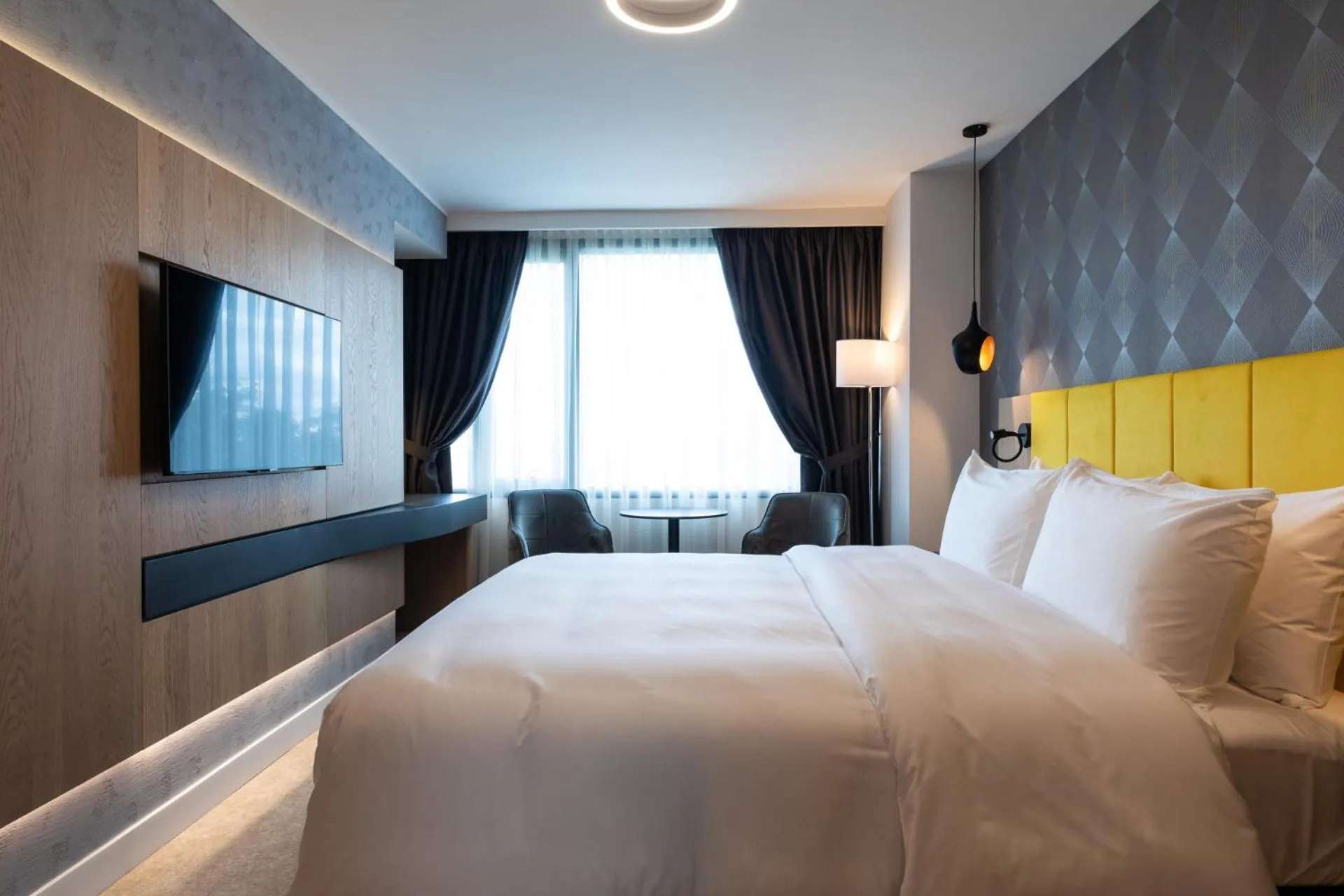 Photo of the whole room, Bed in Ramada by Wyndham Slatina Parc