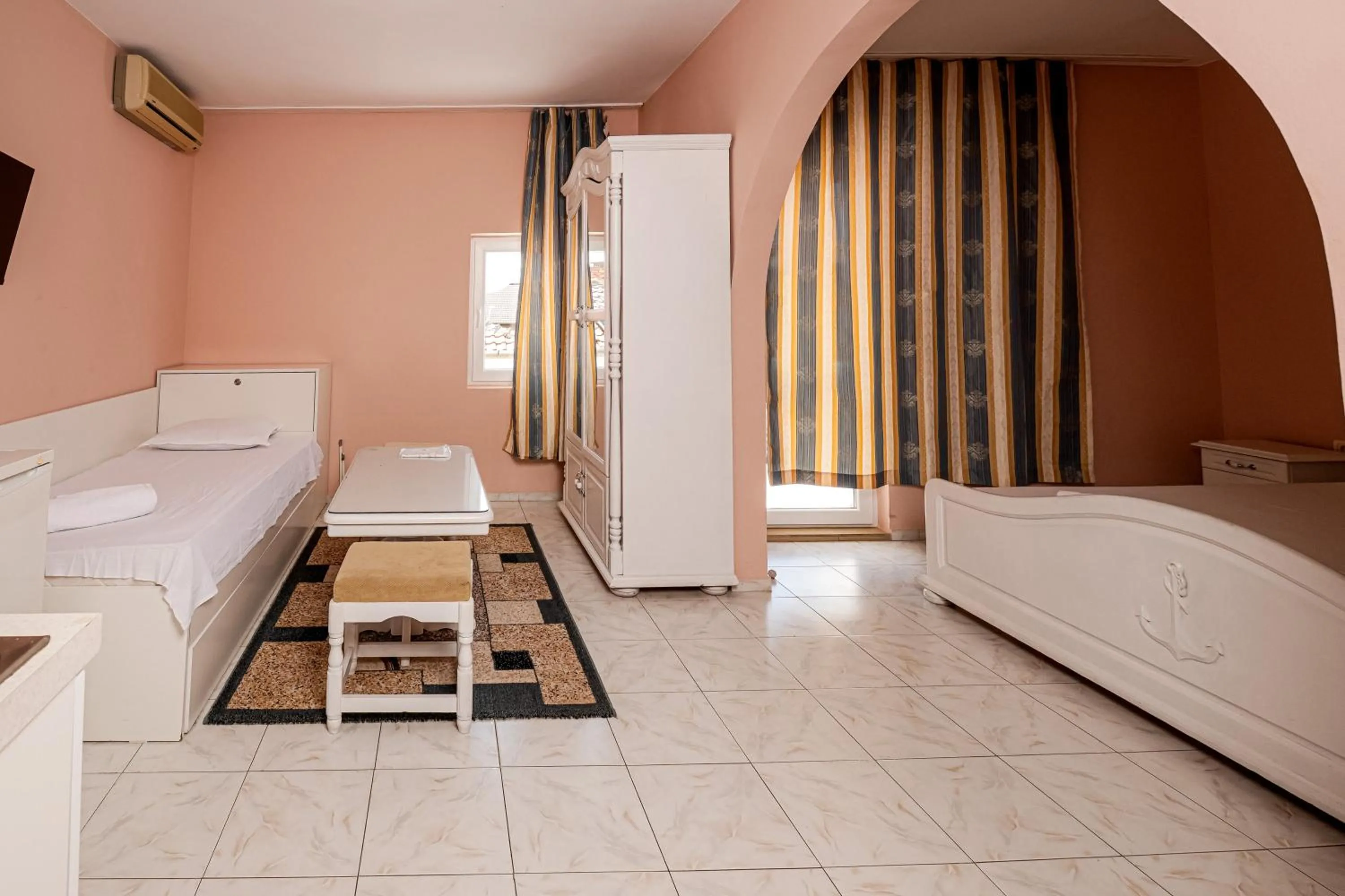 Bed in Family Hotel Paros 2