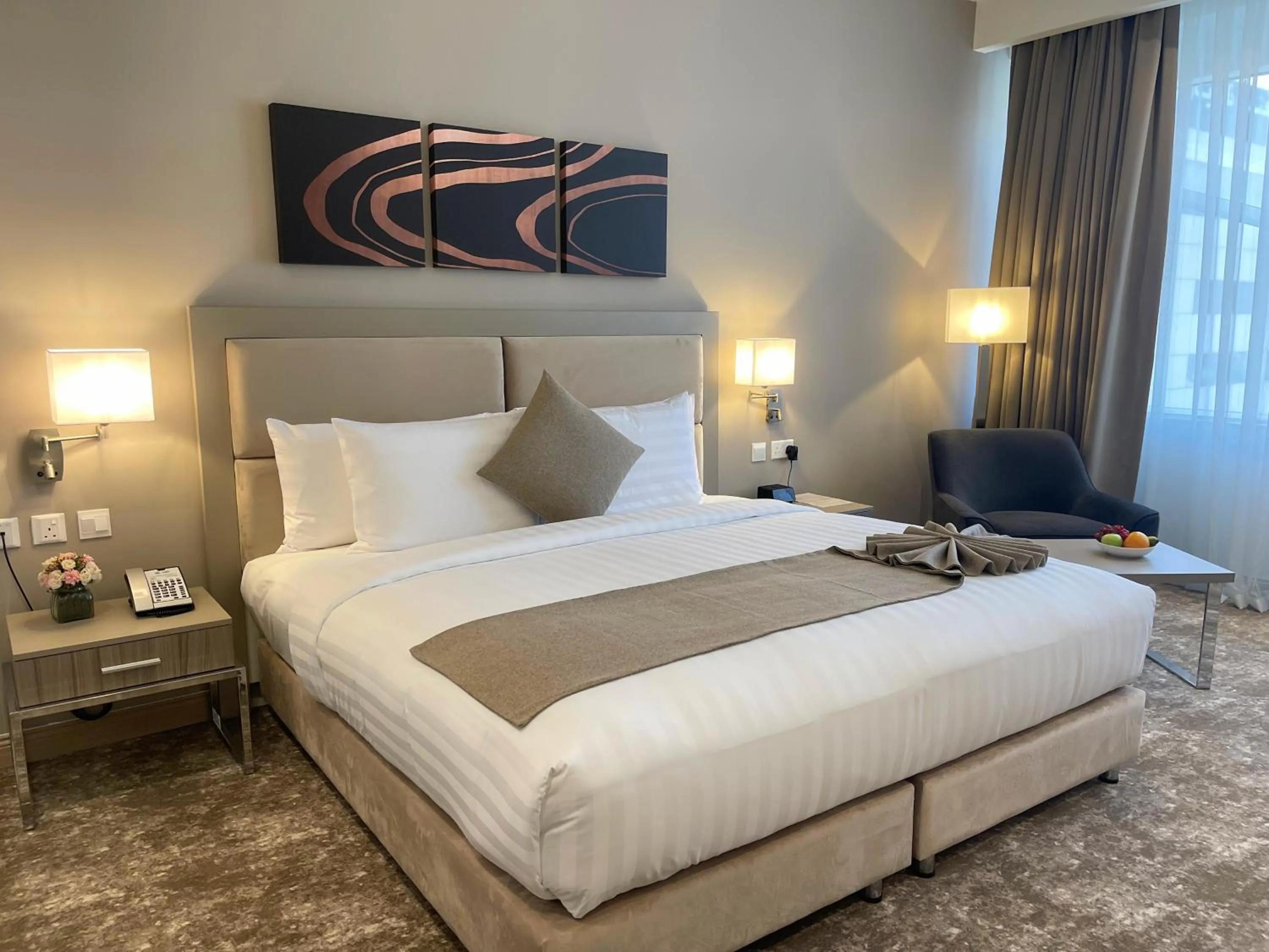 Bed in Gloria Hotel & Suites Doha