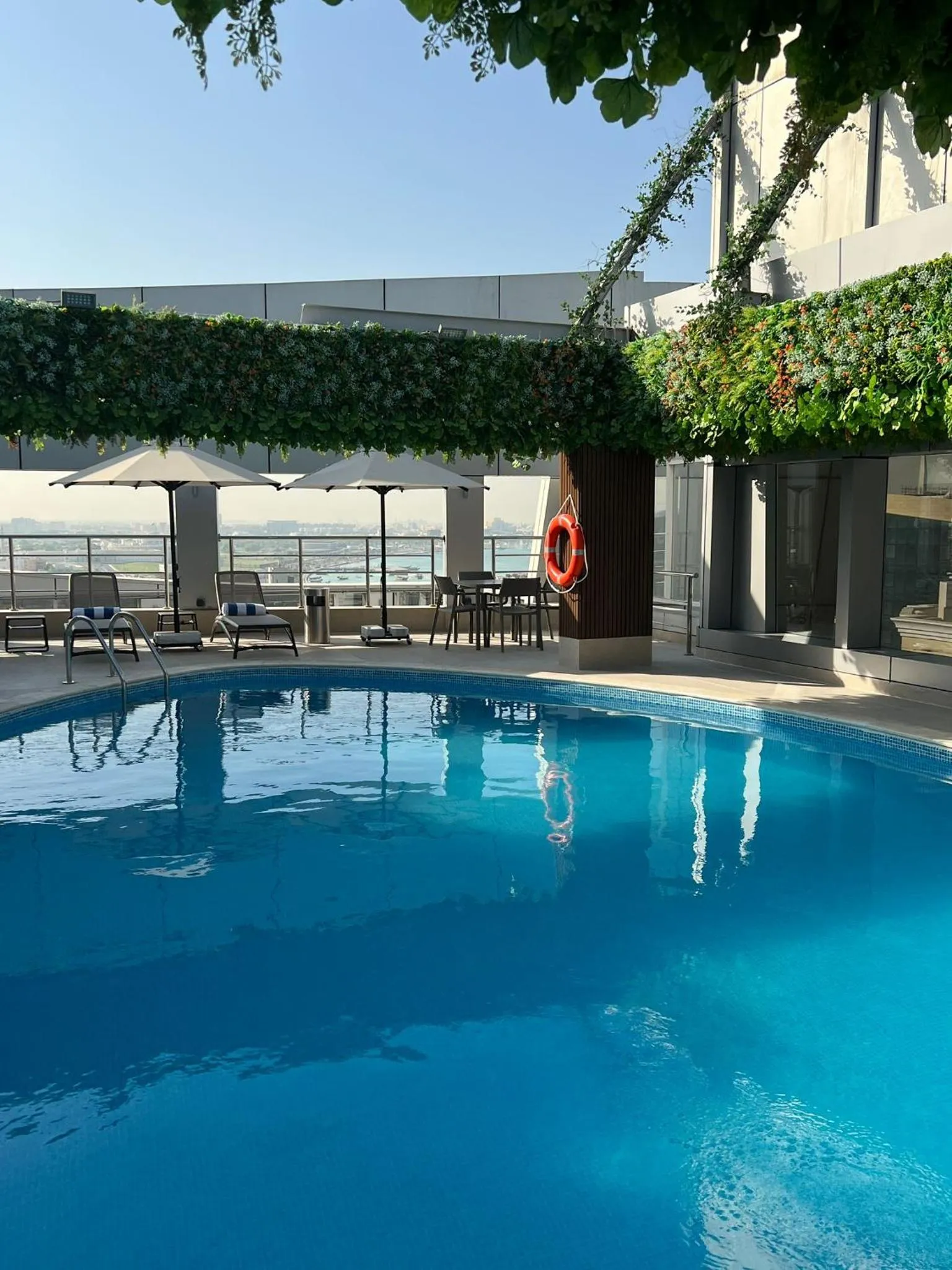 Swimming pool in Gloria Hotel & Suites Doha