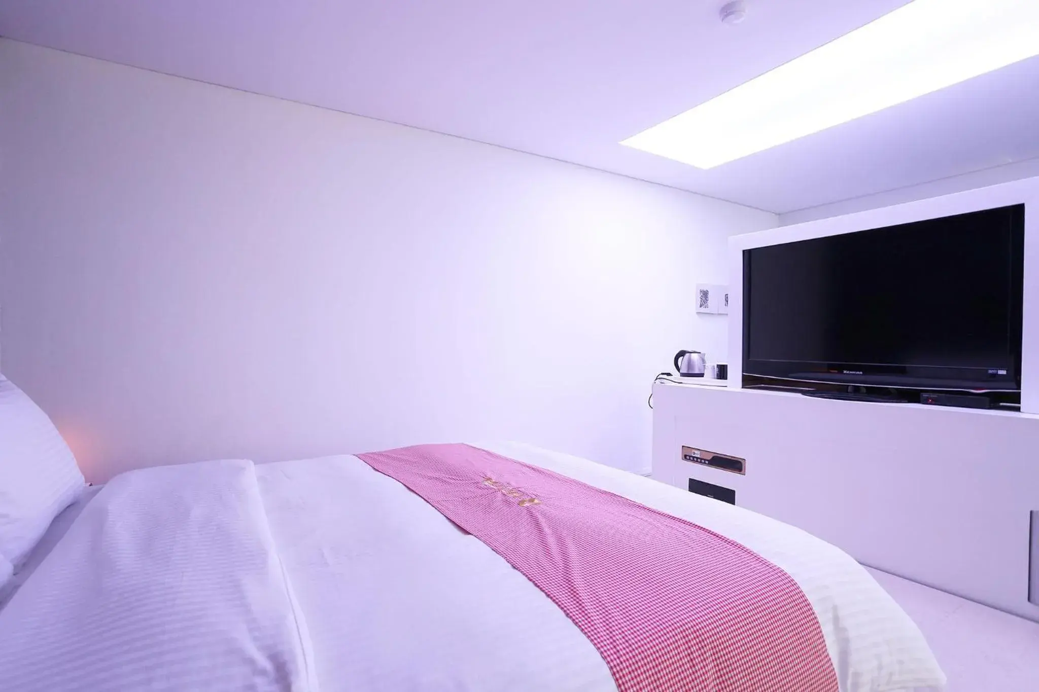 Bed in Q Hotel Bed in Q Hotel