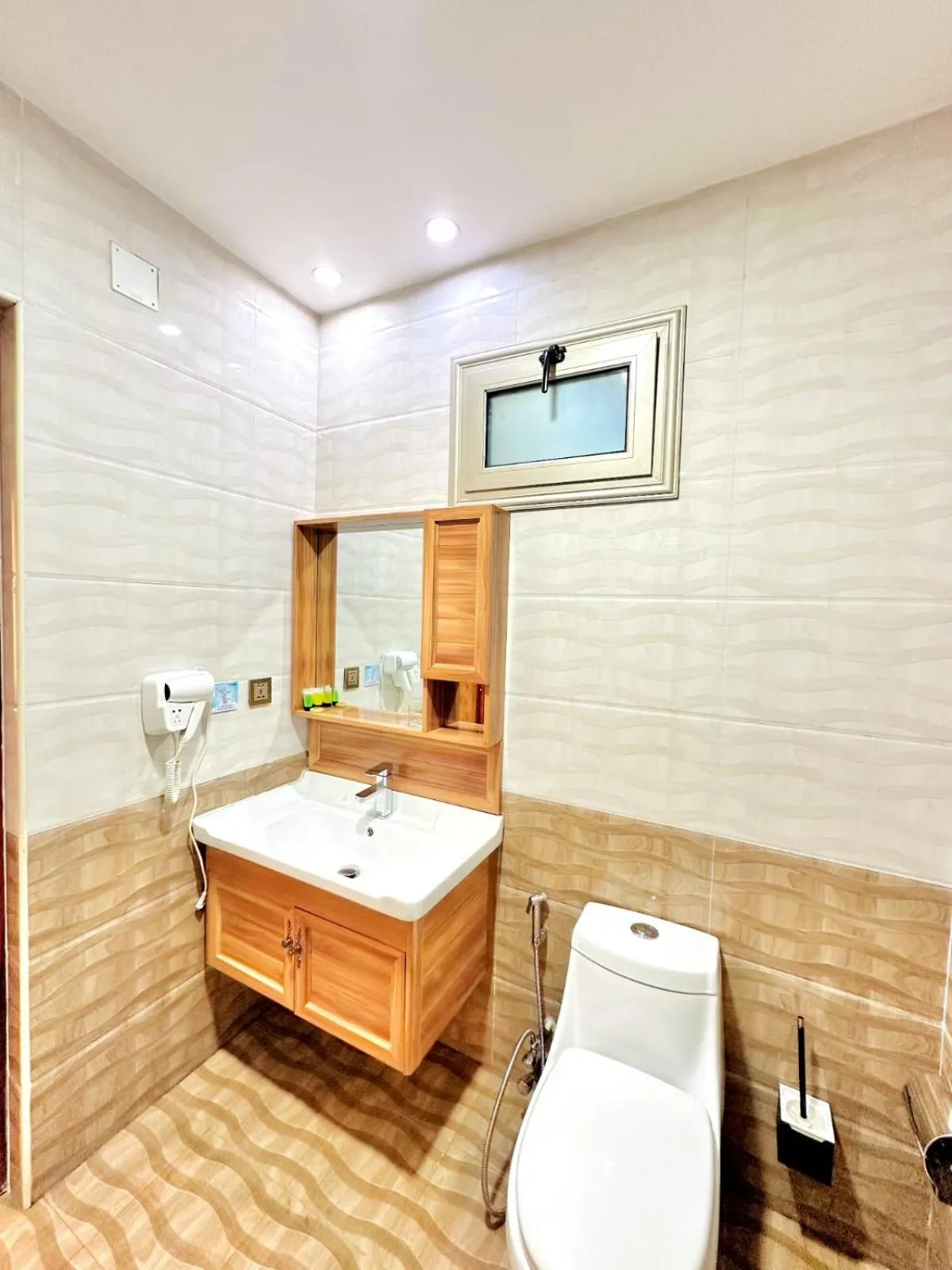 Toilet in Atmosphere Hotel & Spa