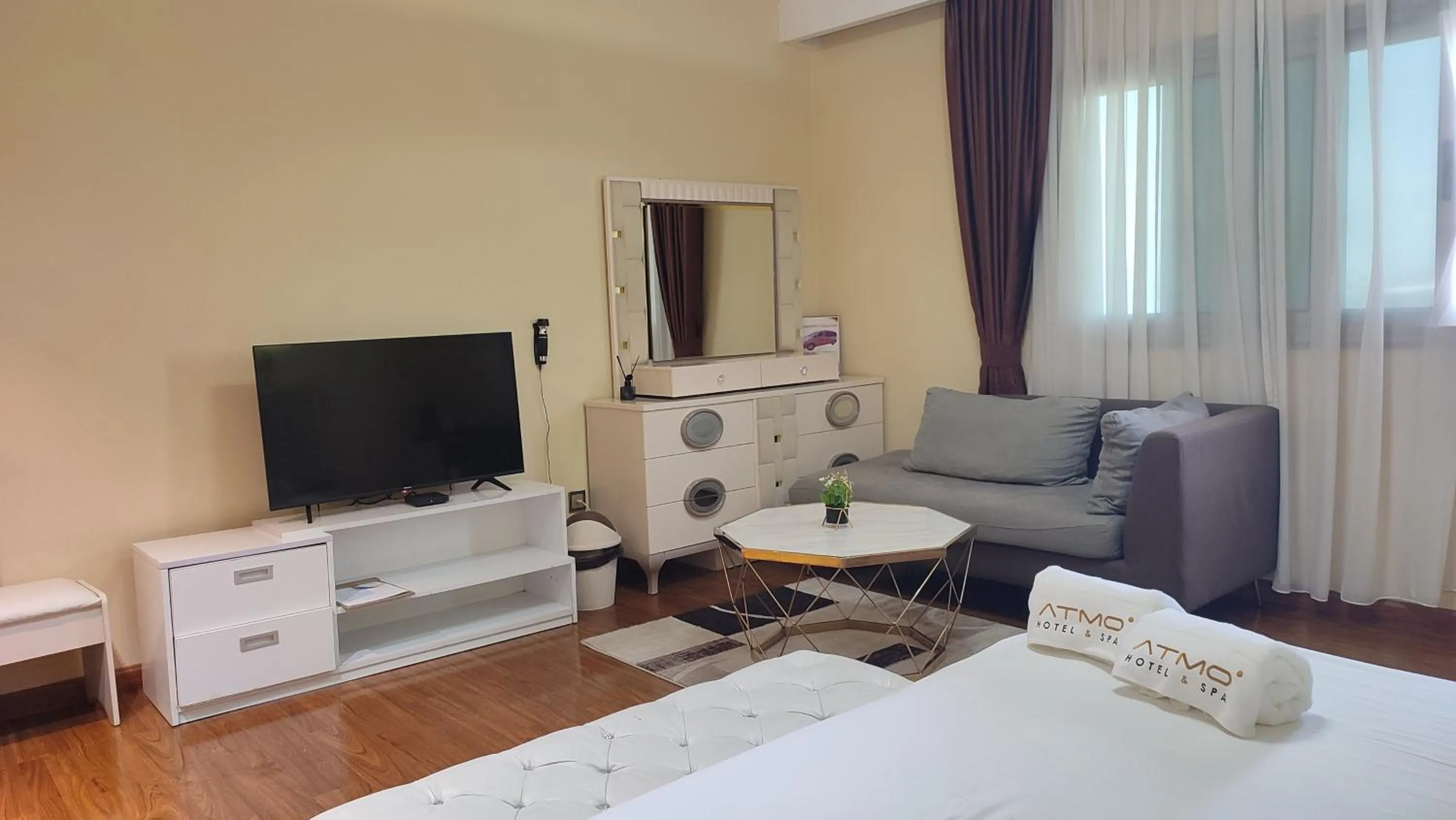 Bed in Atmosphere Hotel & Spa