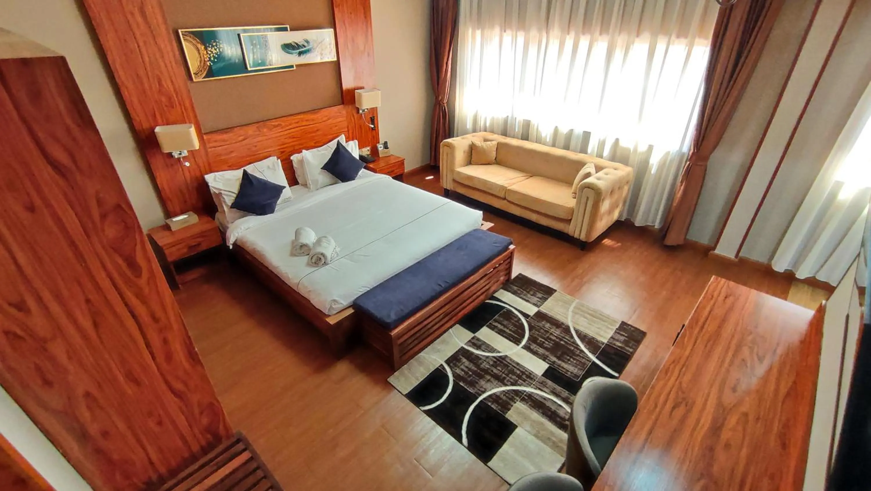 Bed in Atmosphere Hotel & Spa