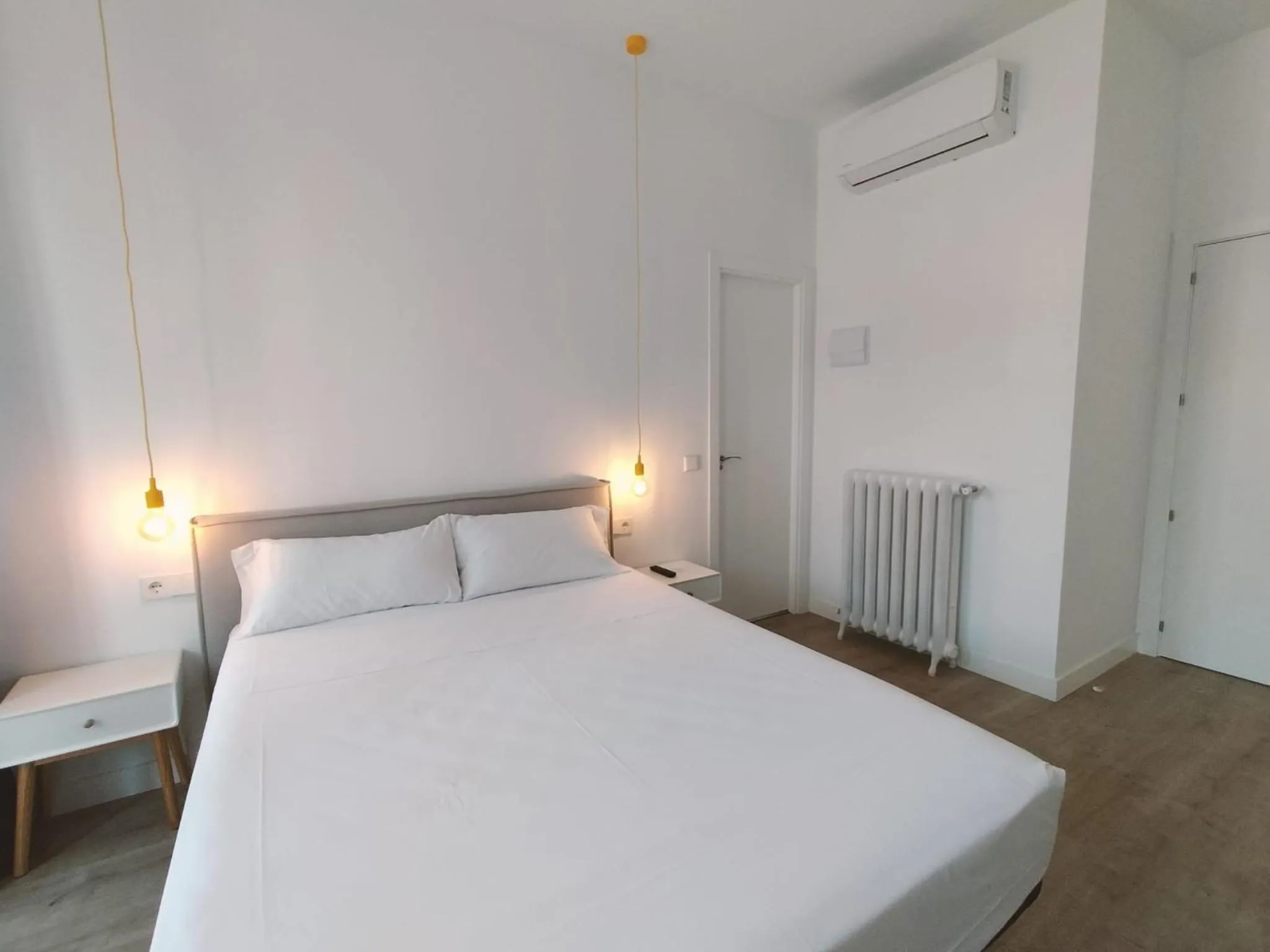 Bed in Hostal Manuela by gaiarooms