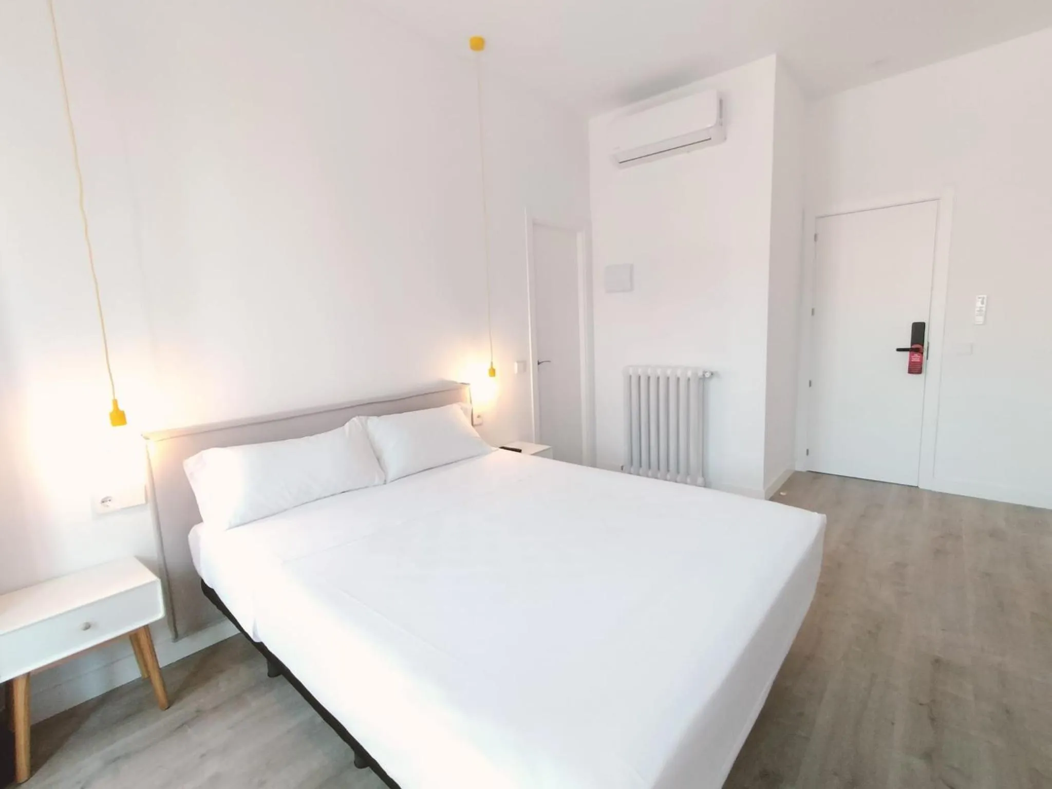 Bed in Hostal Manuela by gaiarooms