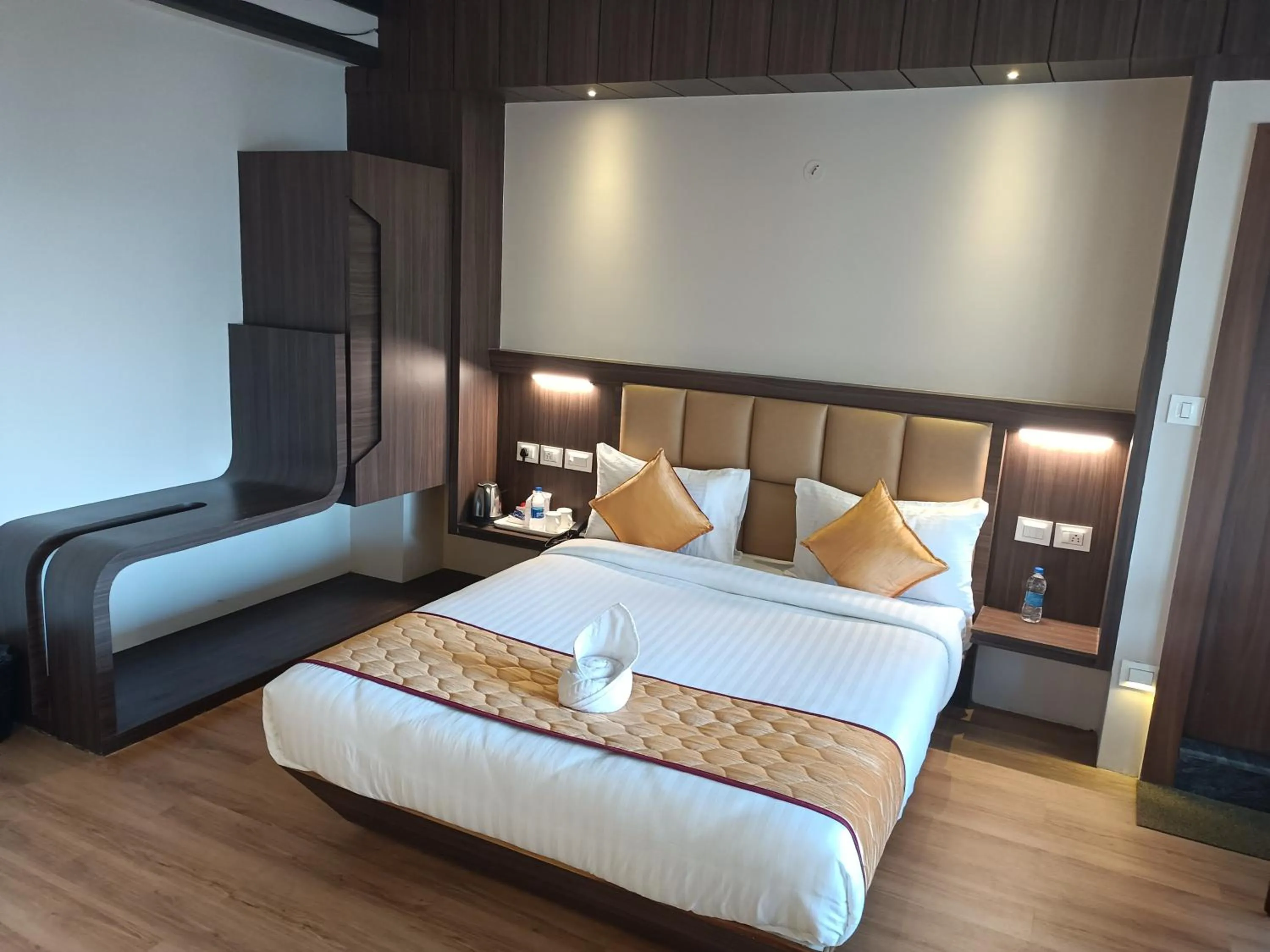 Bed in Golden Peaks Hotel & Restaurant