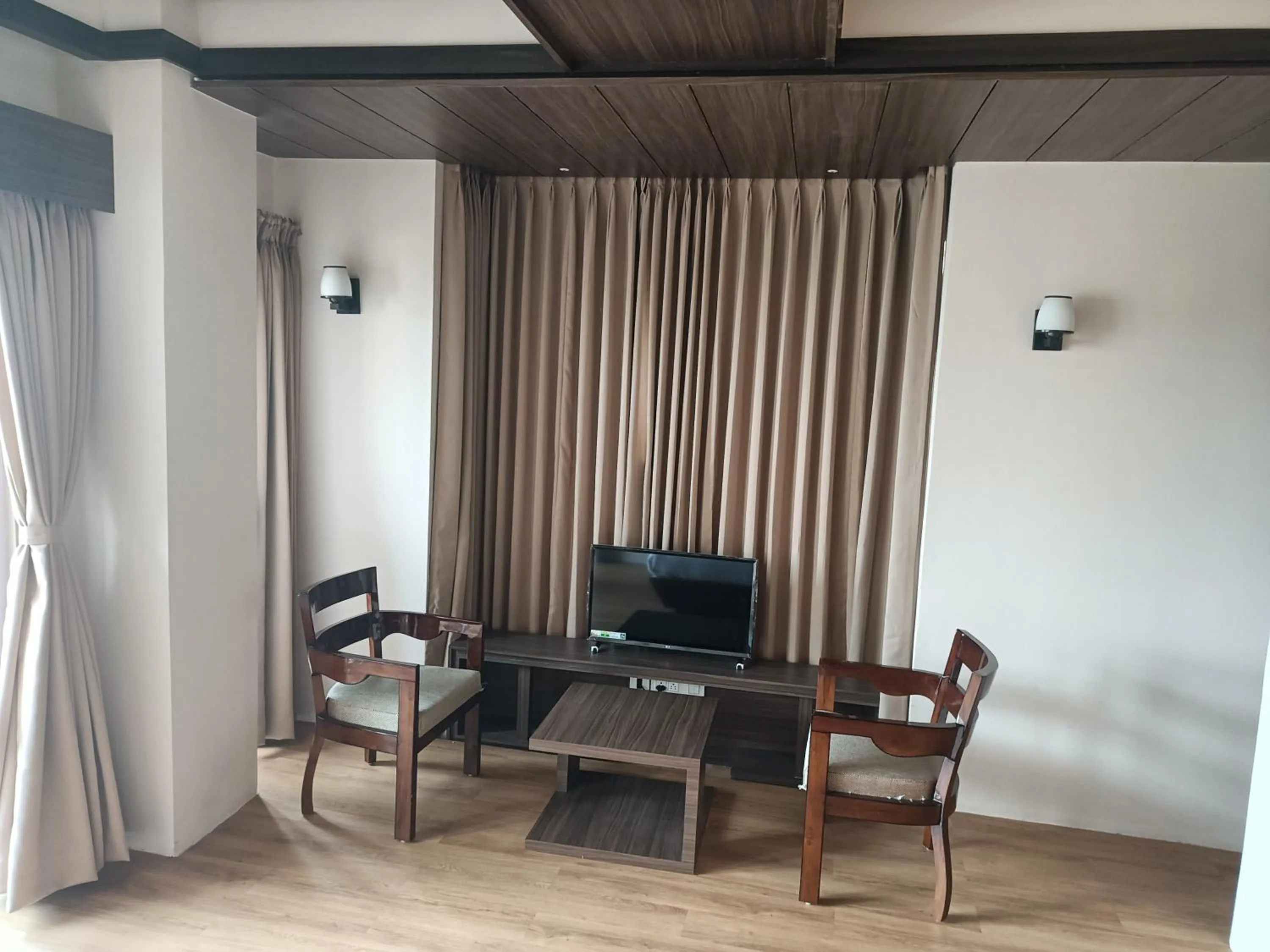 Seating area in Golden Peaks Hotel & Restaurant