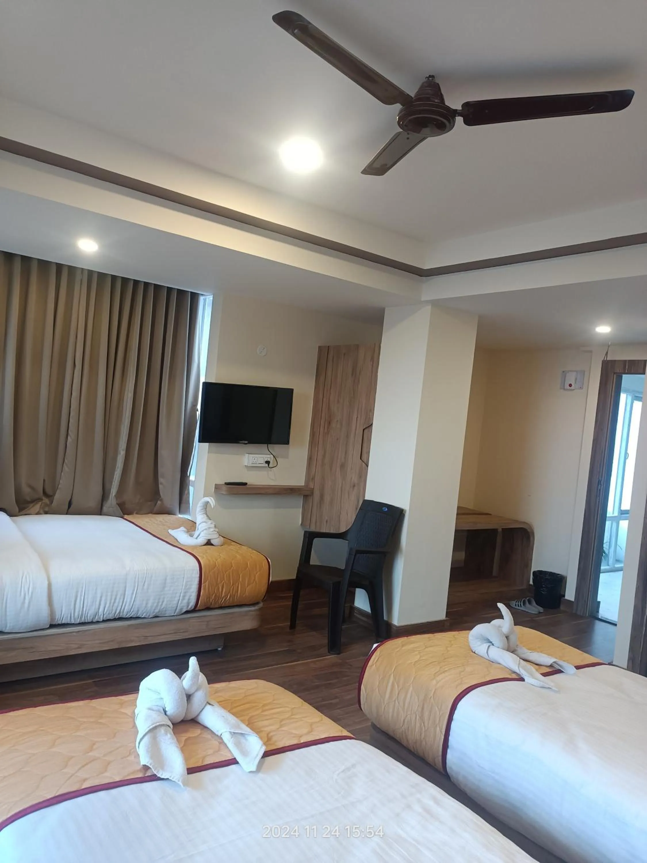 Bed in Golden Peaks Hotel & Restaurant