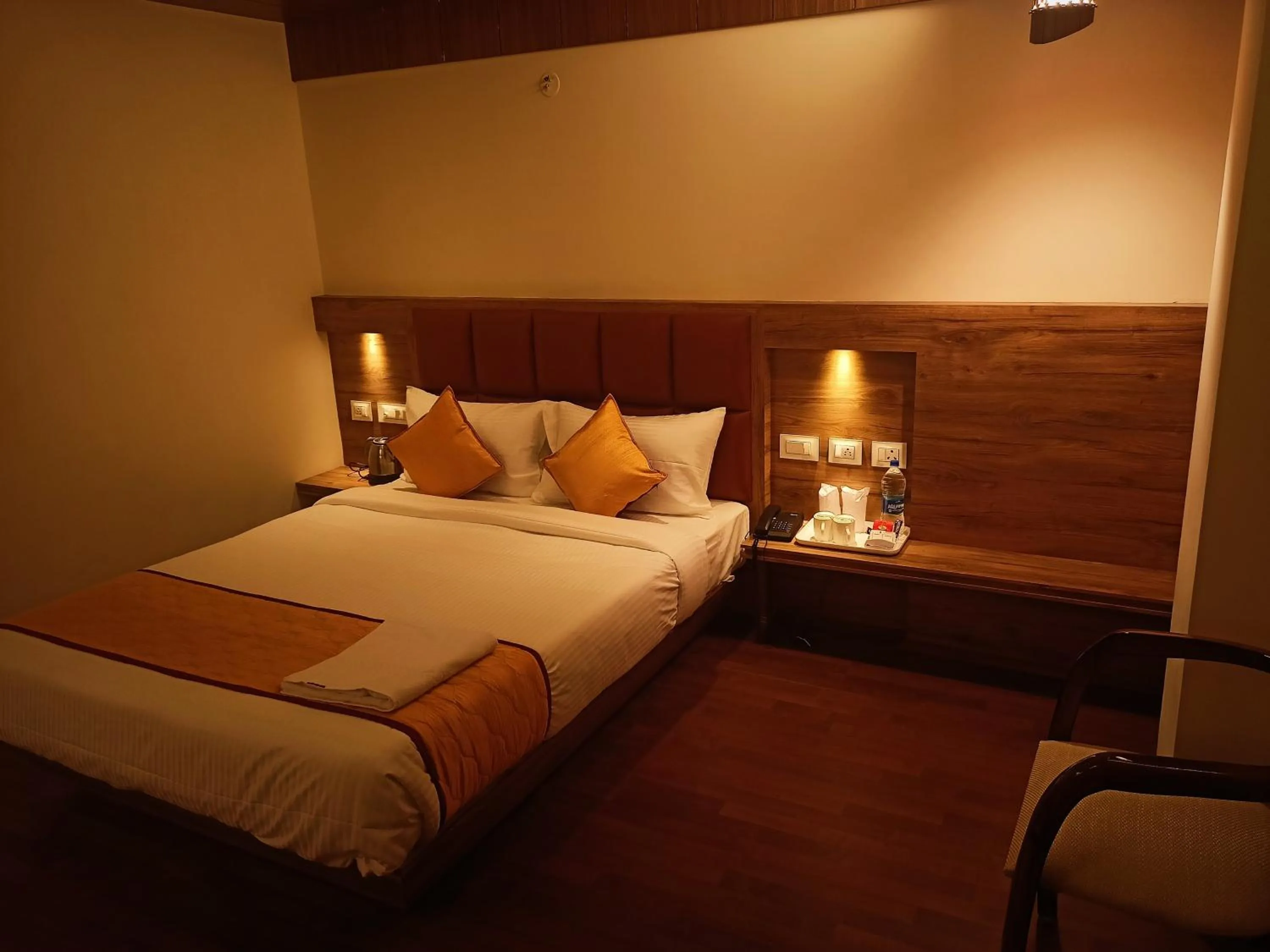 Bed in Golden Peaks Hotel & Restaurant