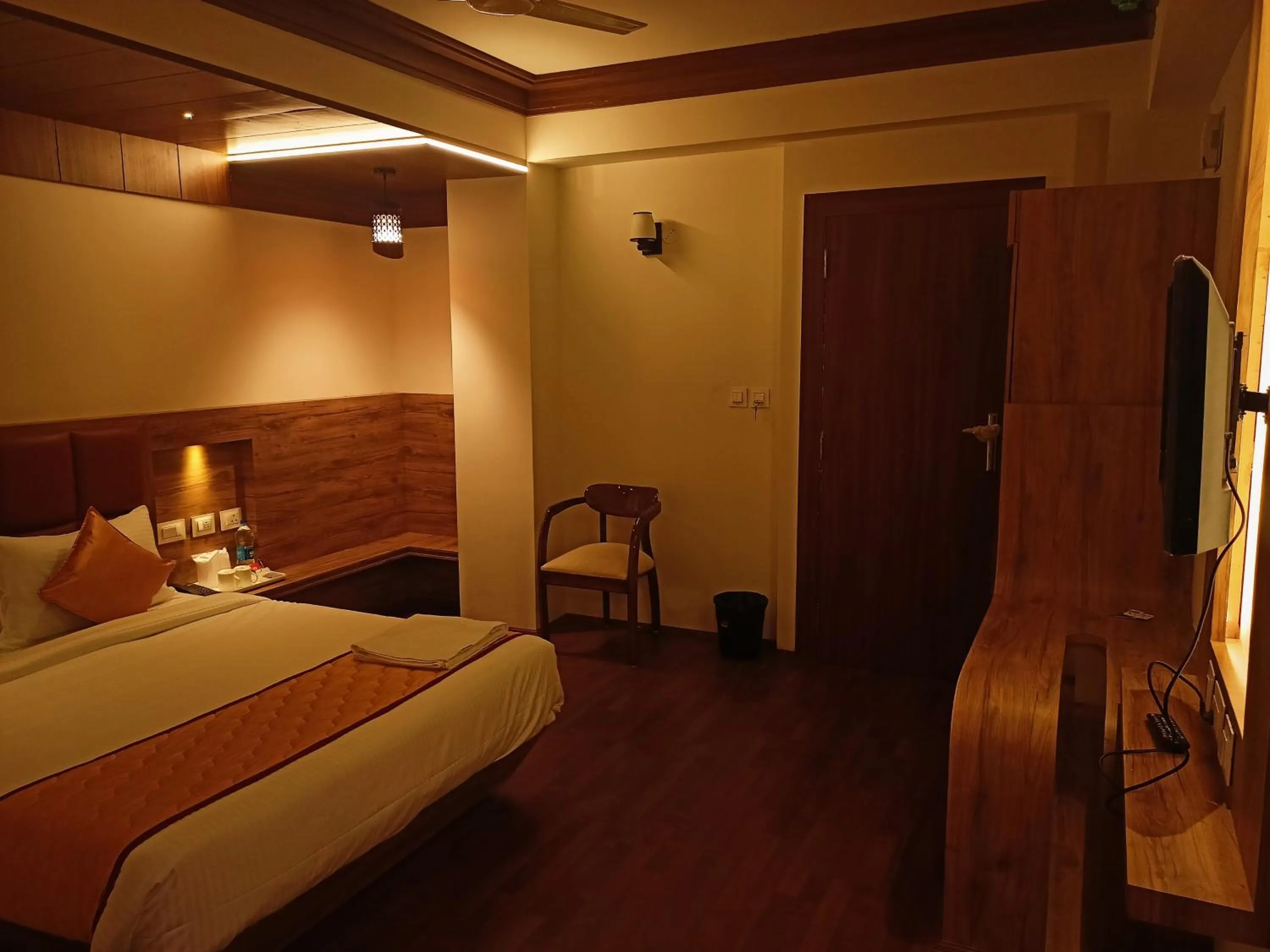 Bed in Golden Peaks Hotel & Restaurant