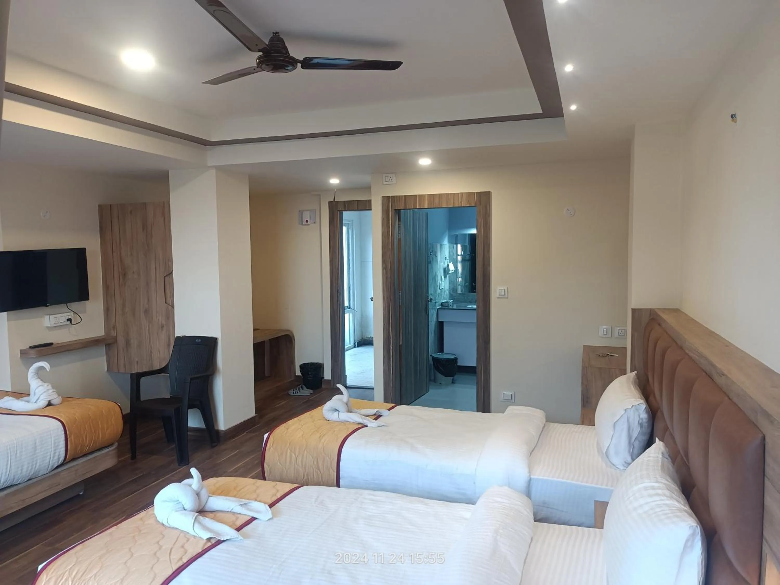 Bed in Golden Peaks Hotel & Restaurant