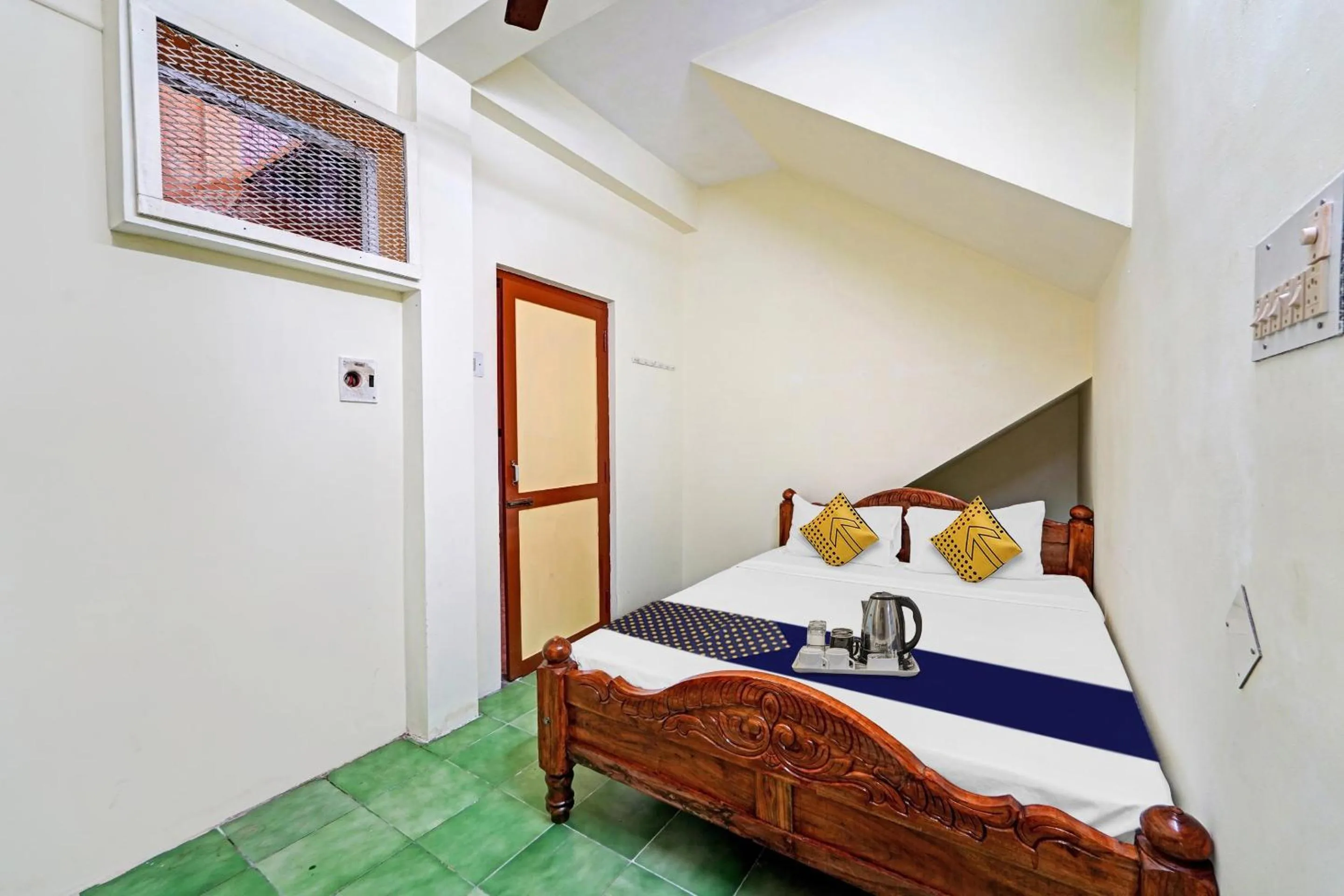 Bedroom in SPOT ON Sri Sakthi Guest House