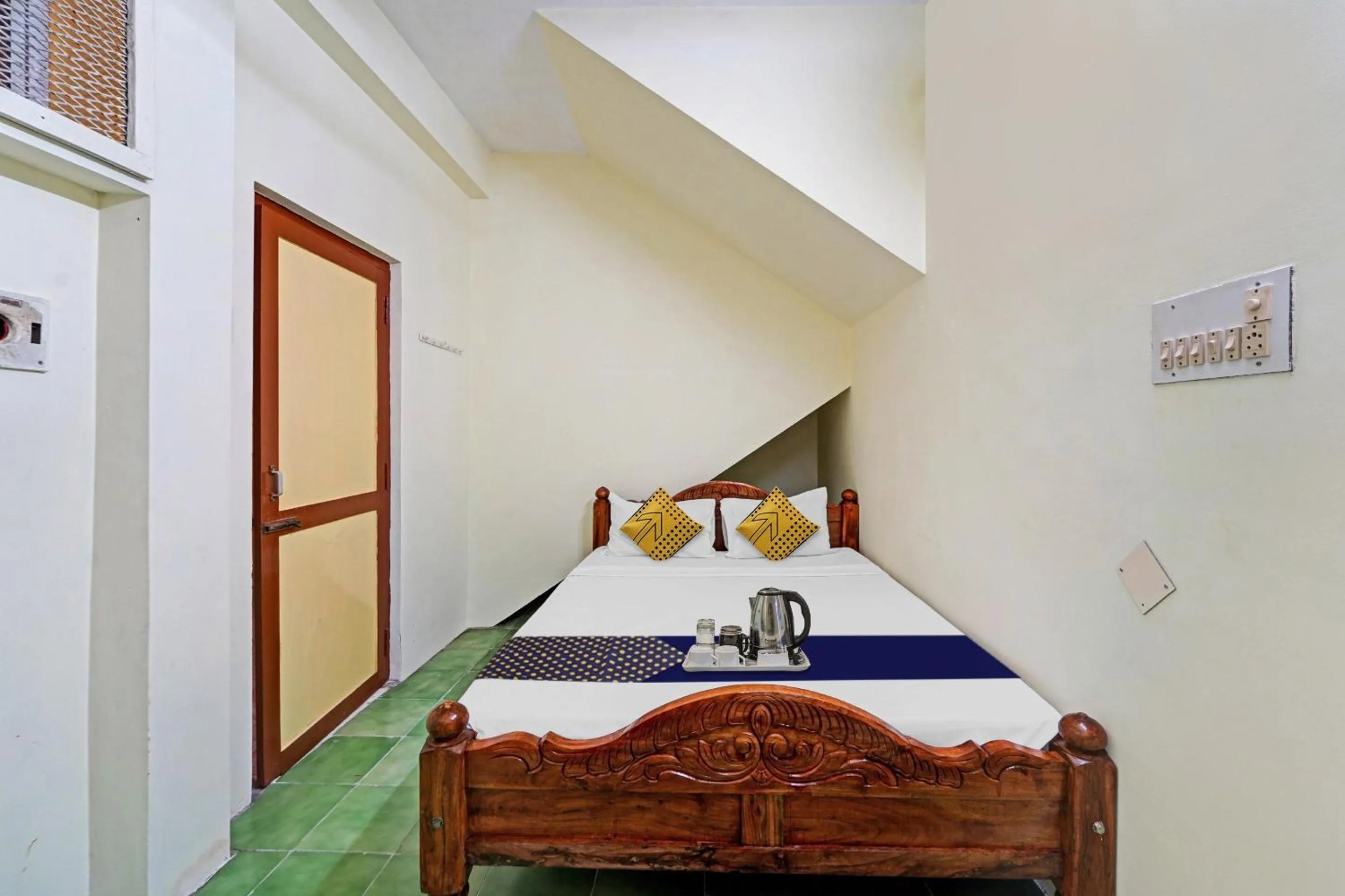 Bedroom in SPOT ON Sri Sakthi Guest House