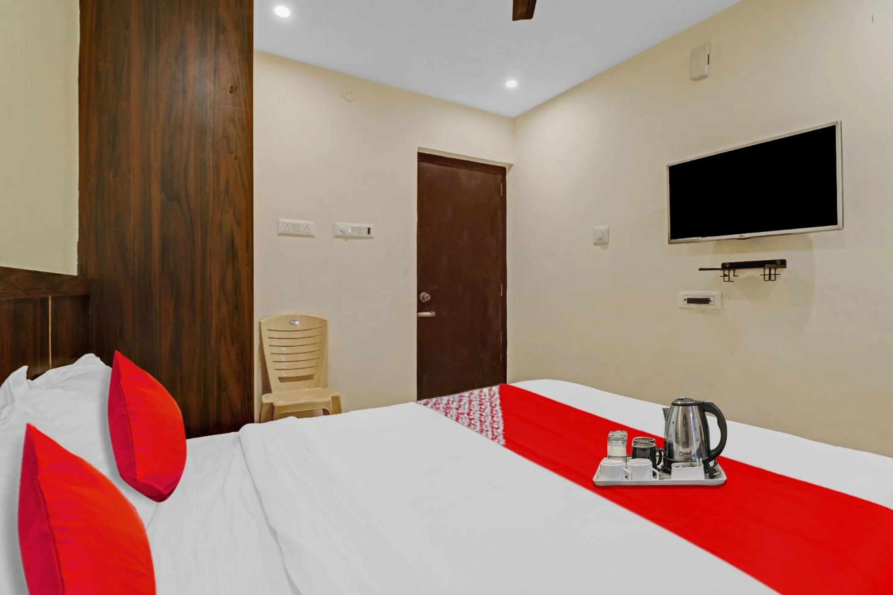 Bedroom in Hotel O GN Nelli Suites