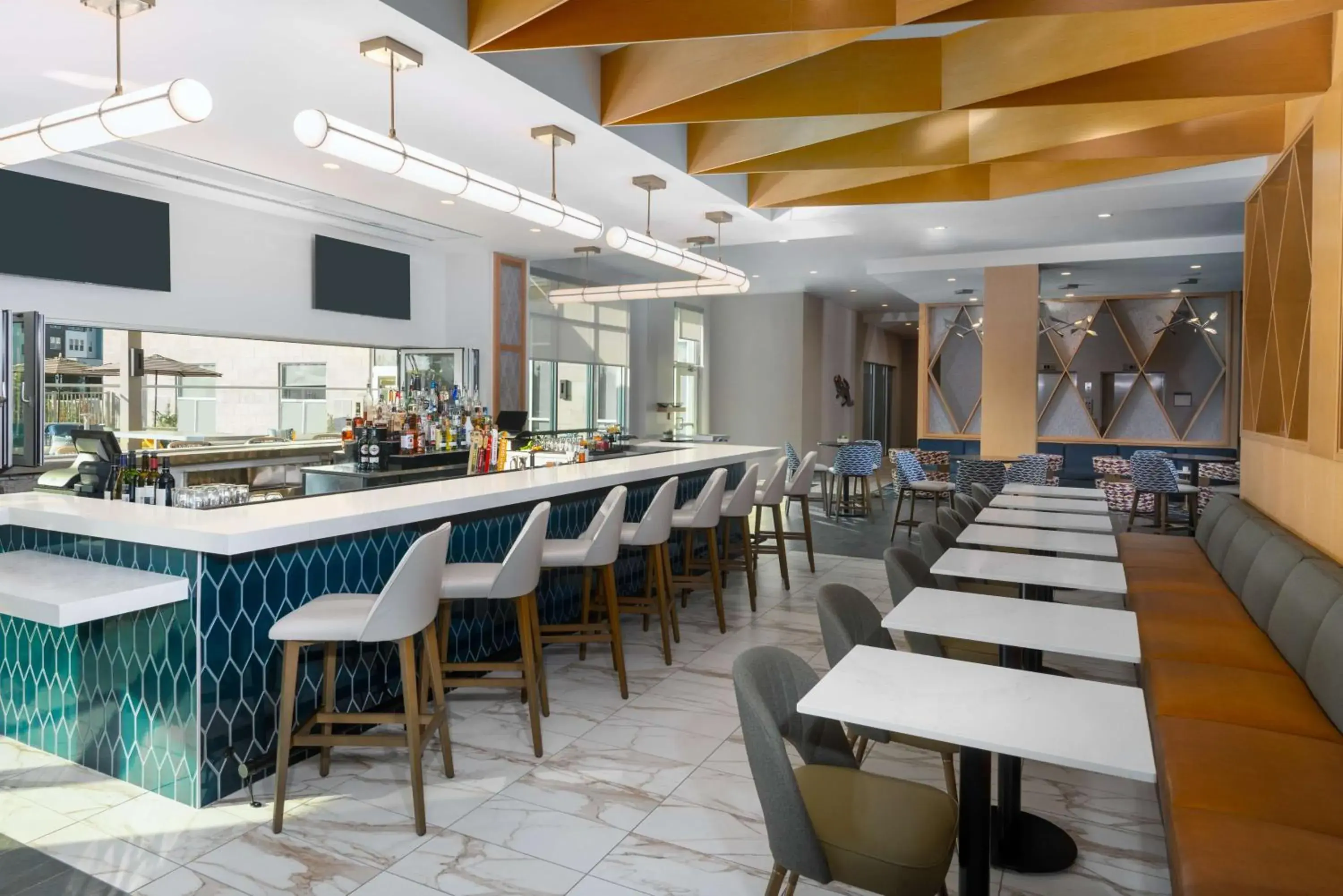 Lounge or bar in Hyatt House Orlando Airport Lounge or bar in Hyatt House Orlando Airport