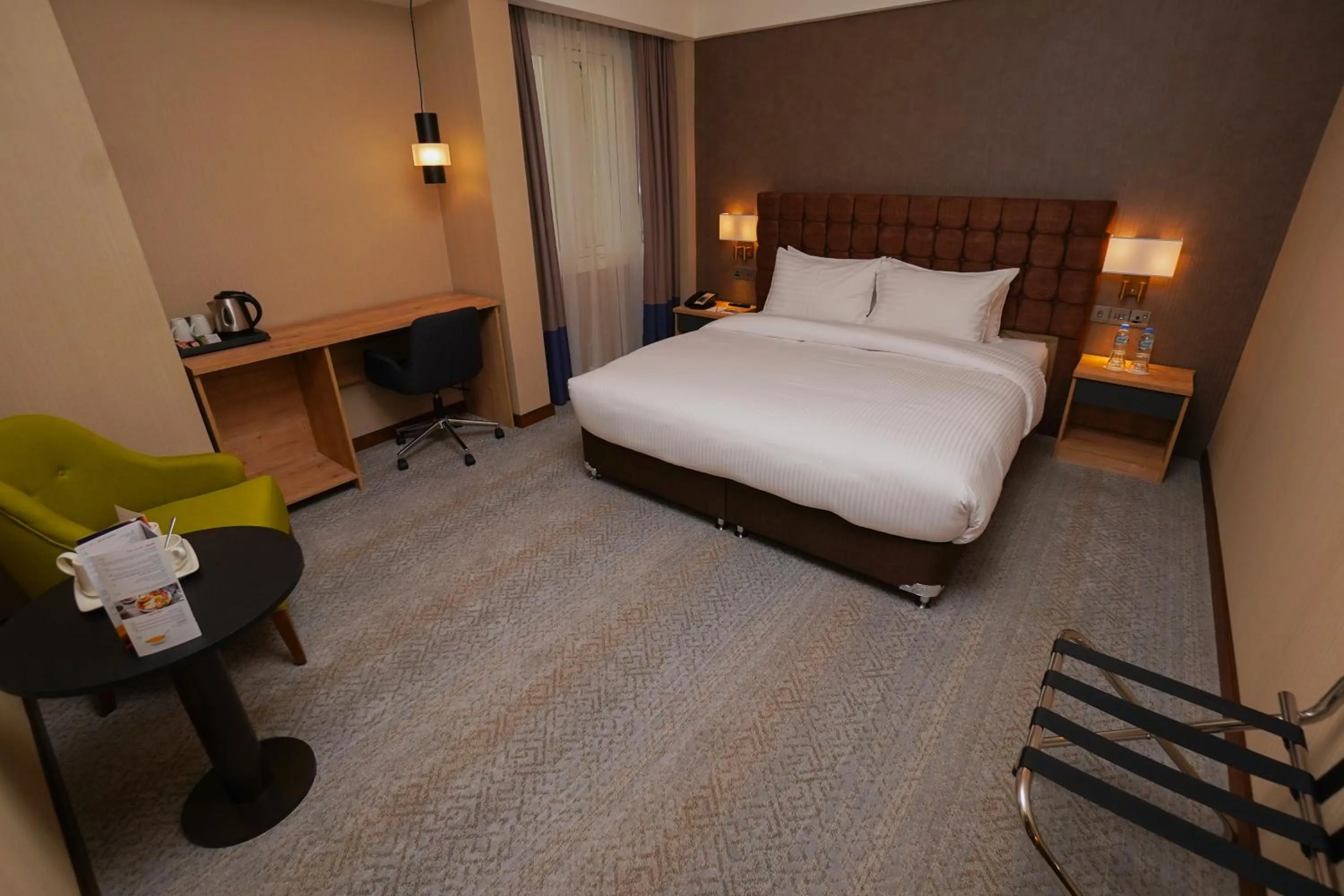 Bed in The Grand Lux Hotel