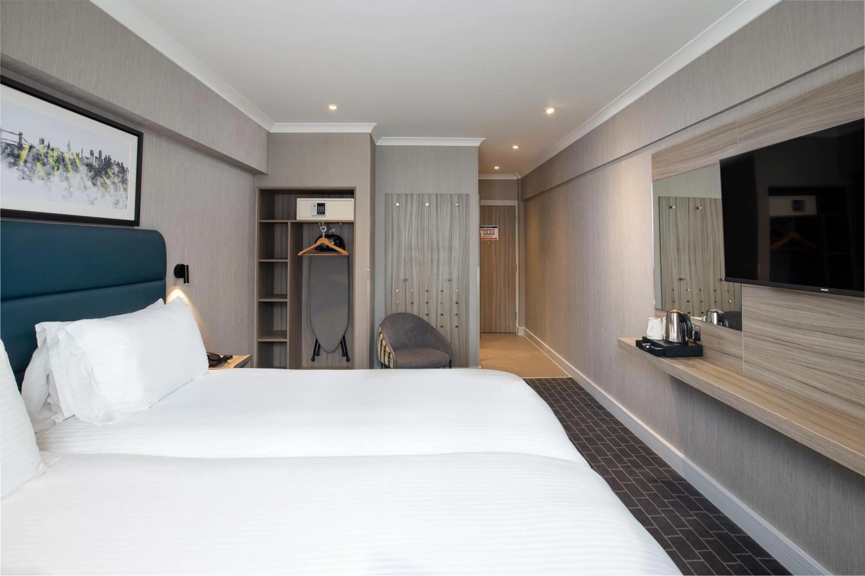 Photo of the whole room, Bed in City Sleeper at Royal National Hotel