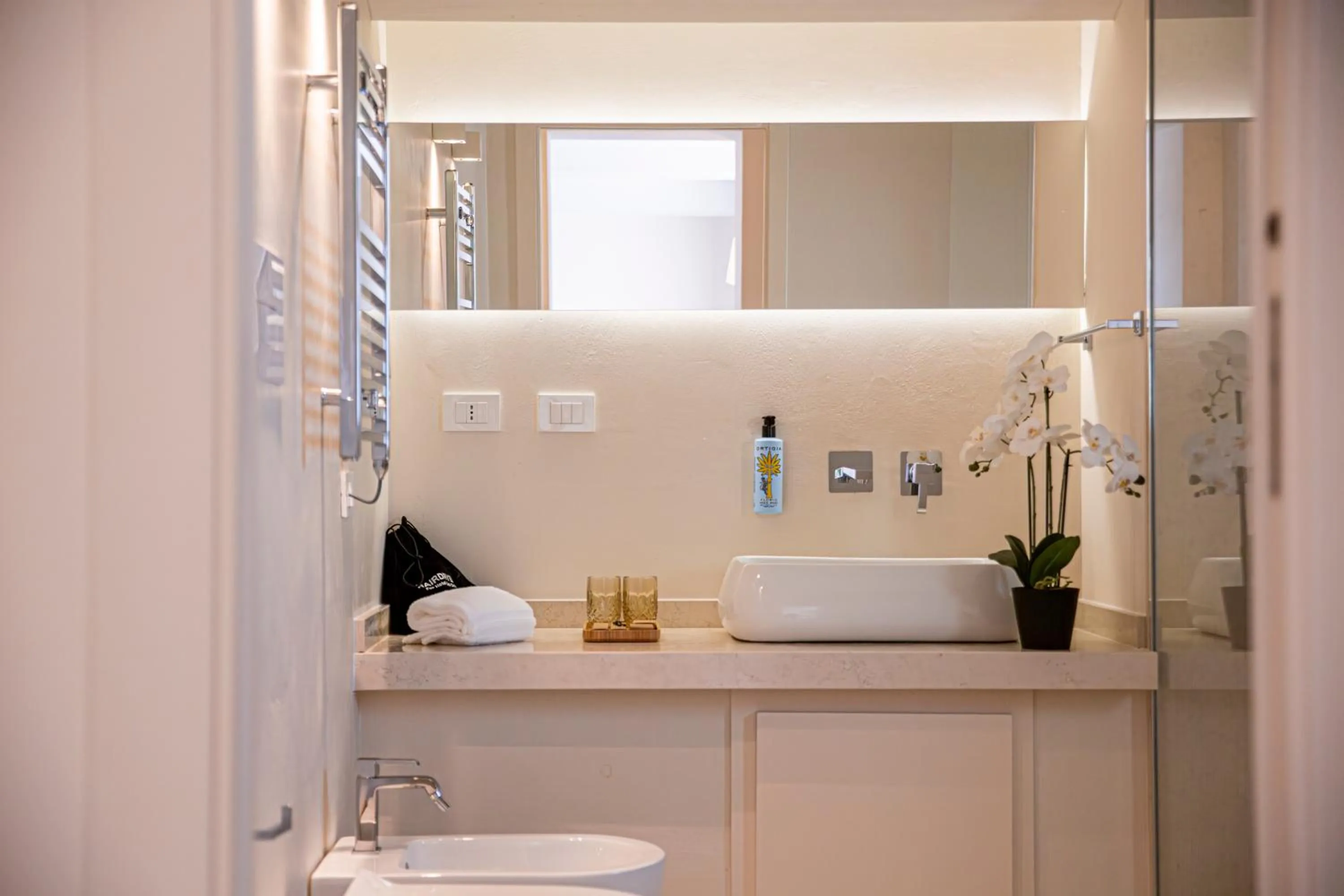 Toilet in Costamante Suites & Spa