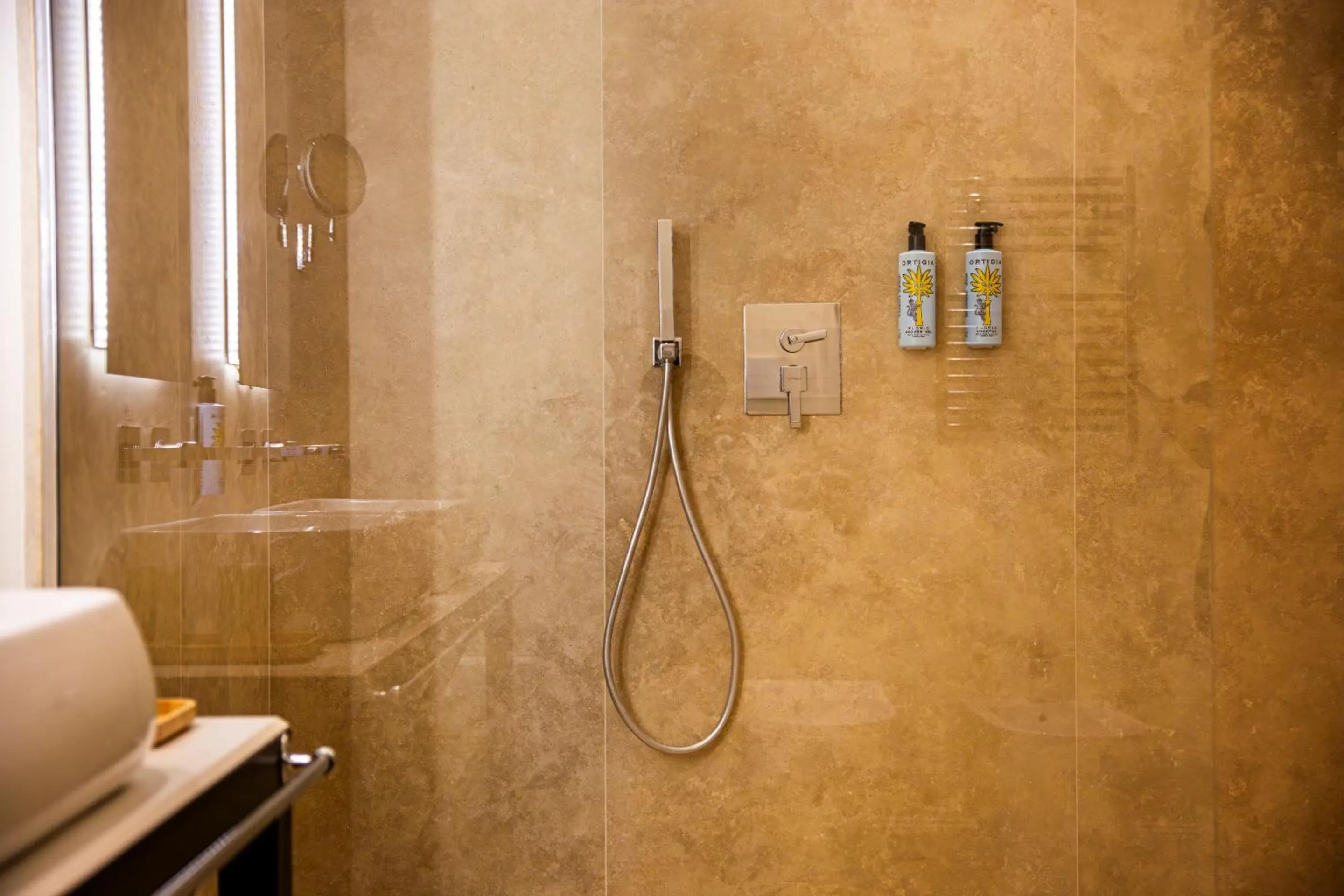 Shower in Costamante Suites & Spa