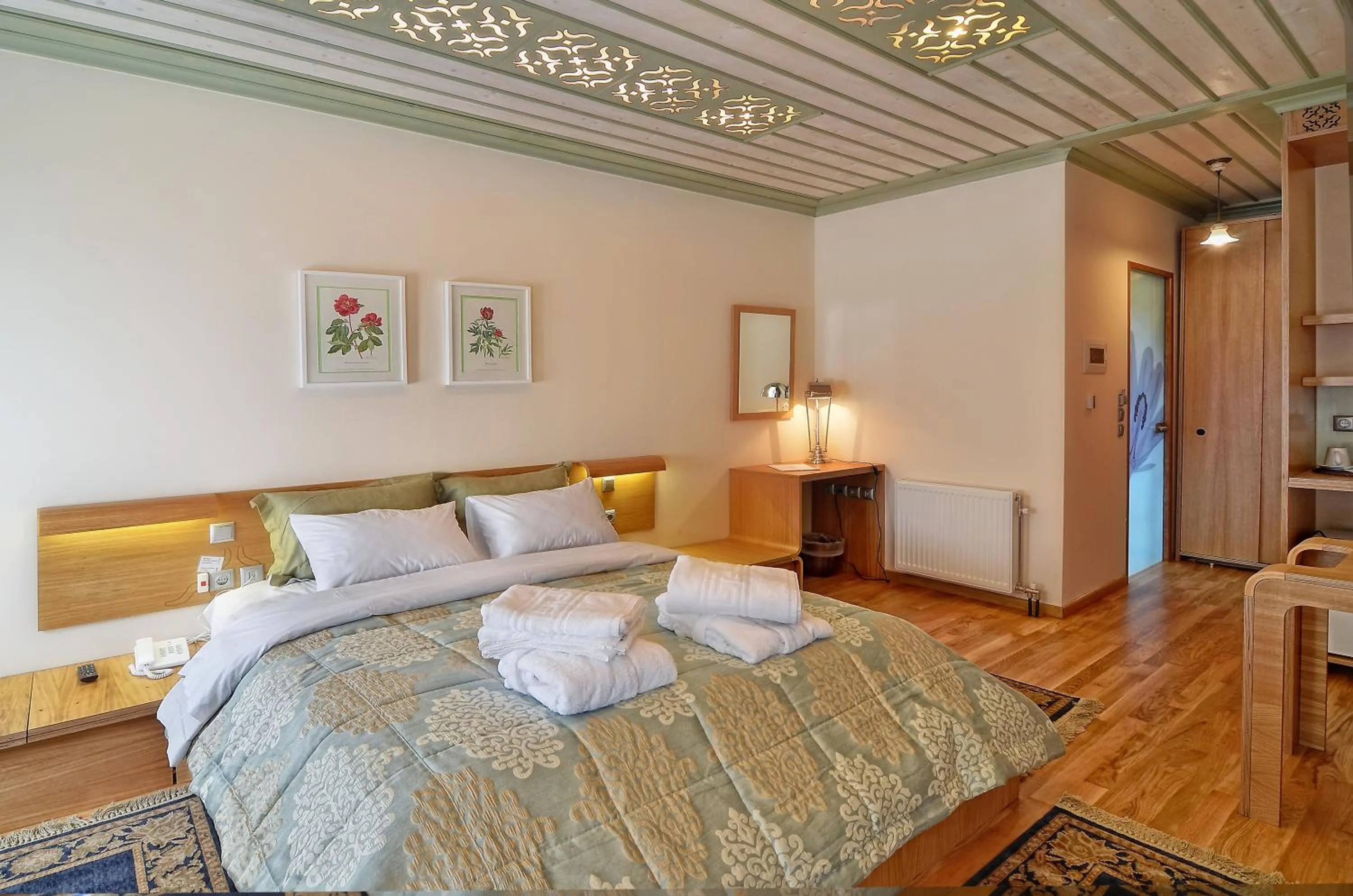 Bed in Dilofo Hotel Luxury Suites