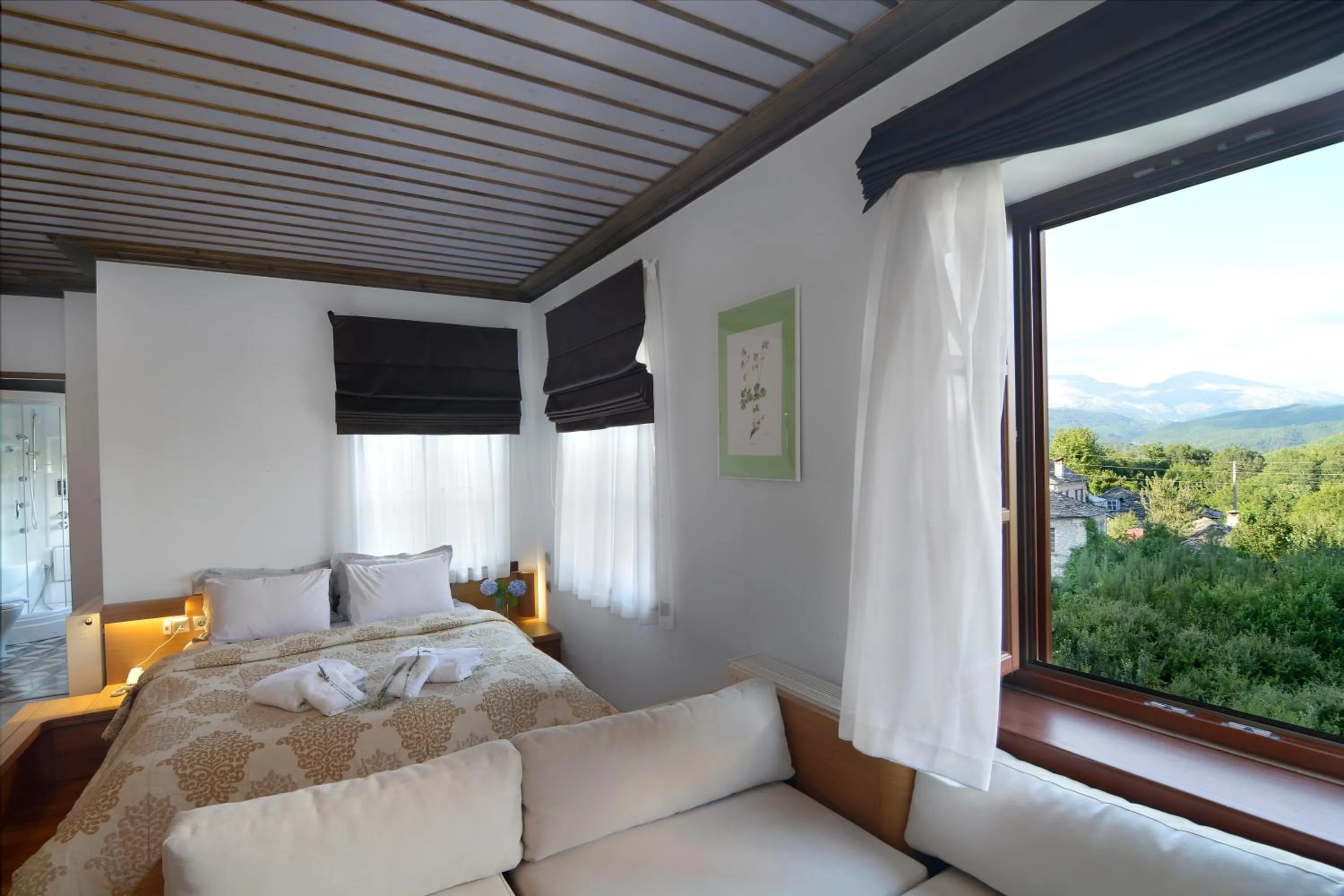 View (from property/room), Bed in Dilofo Hotel Luxury Suites