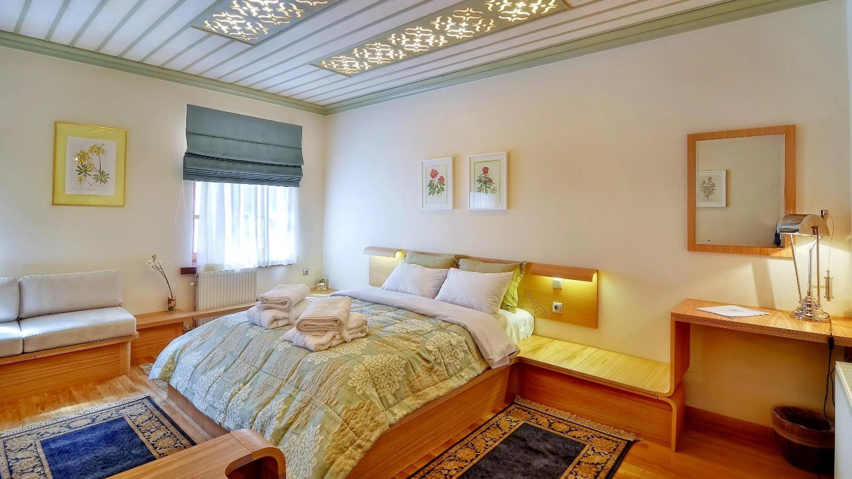 Bed in Dilofo Hotel Luxury Suites