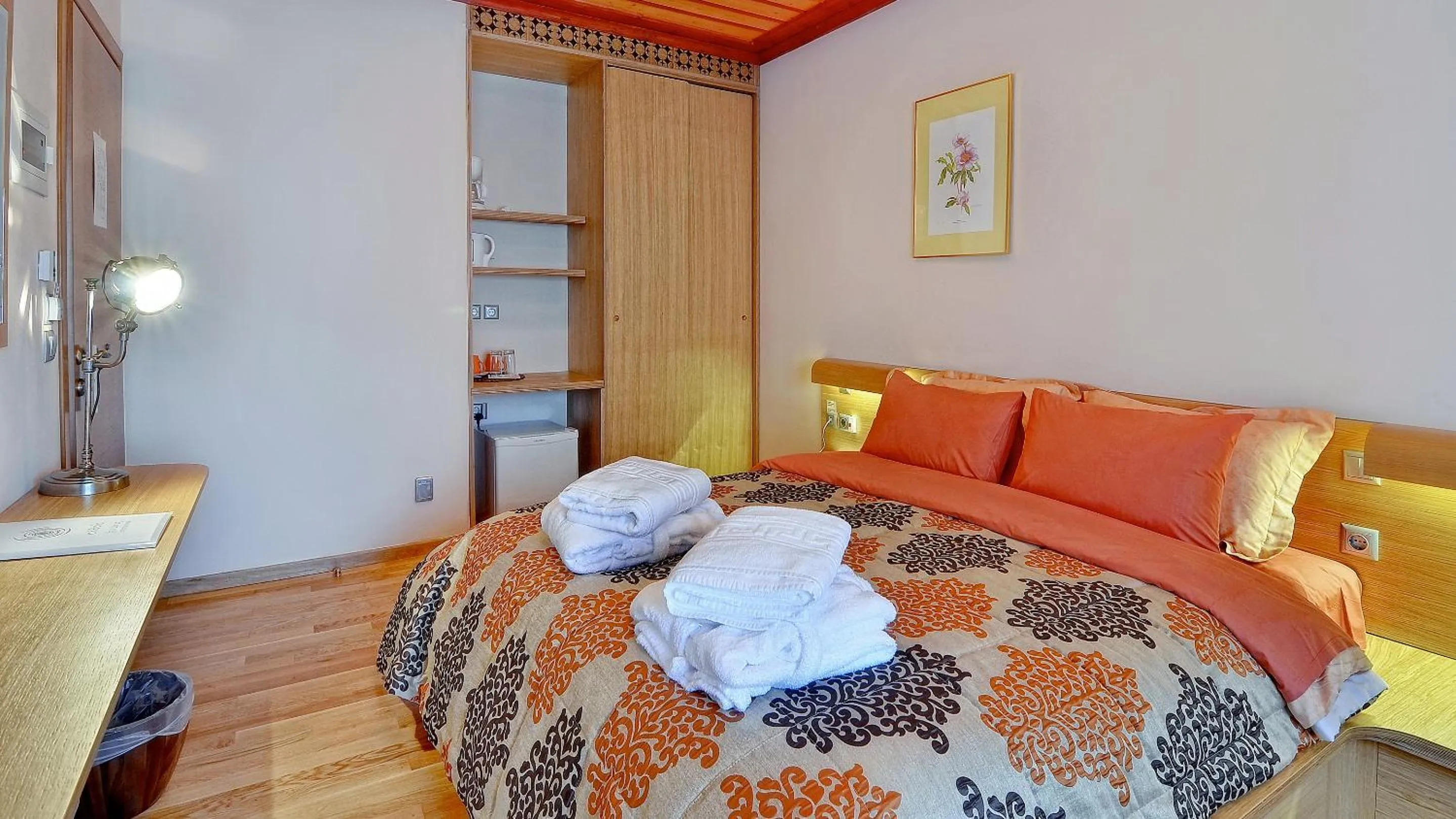 Bed in Dilofo Hotel Luxury Suites