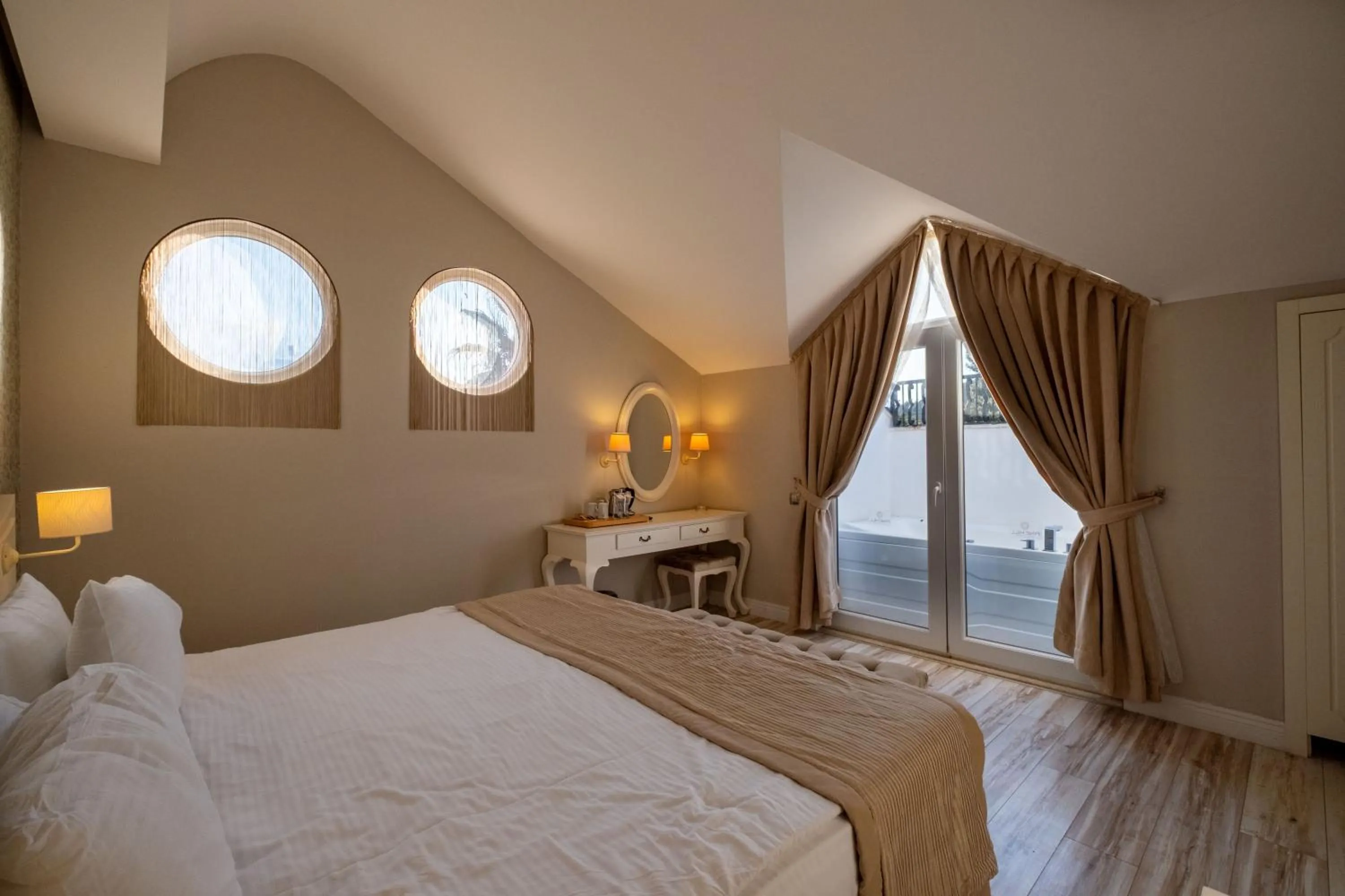 Bed in Pinehill Hotel & Suites