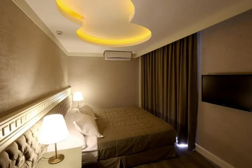 Bed in Pinehill Hotel & Suites Bed in Pinehill Hotel & Suites