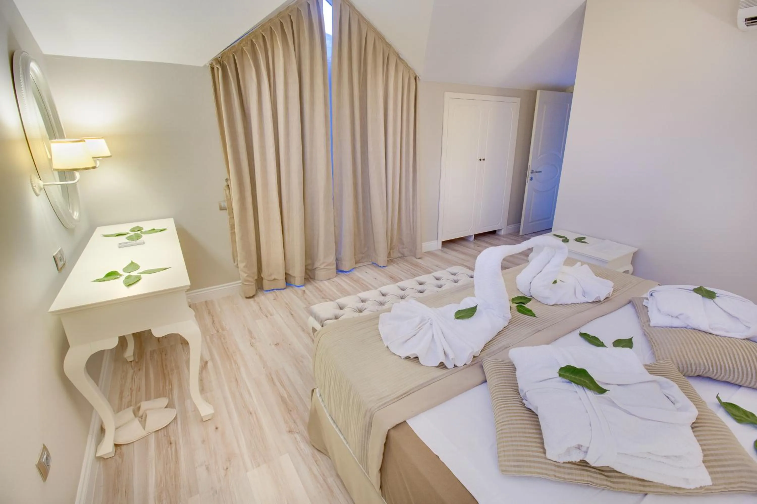 Photo of the whole room, Bed in Pinehill Hotel & Suites