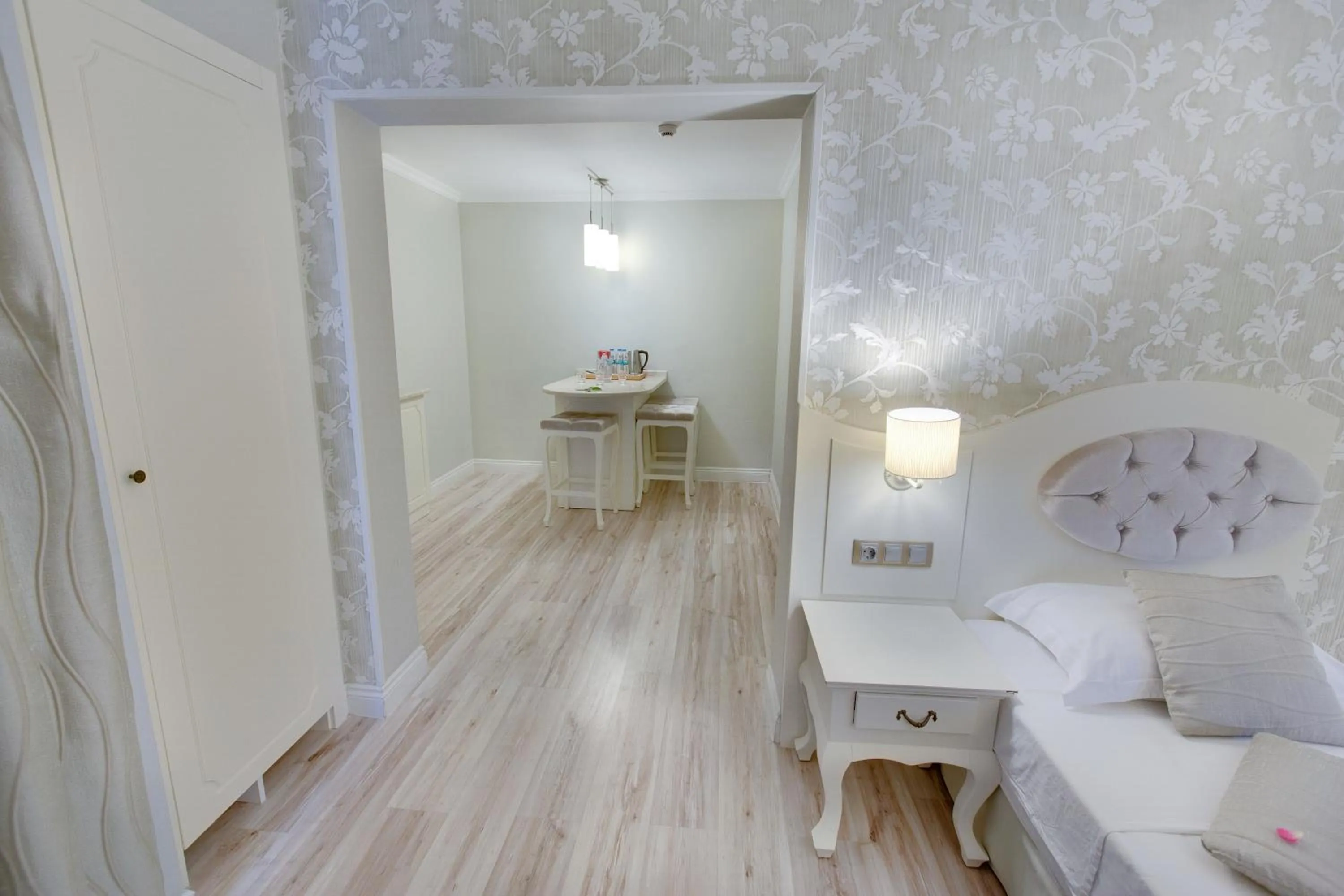 Photo of the whole room, Bed in Pinehill Hotel & Suites