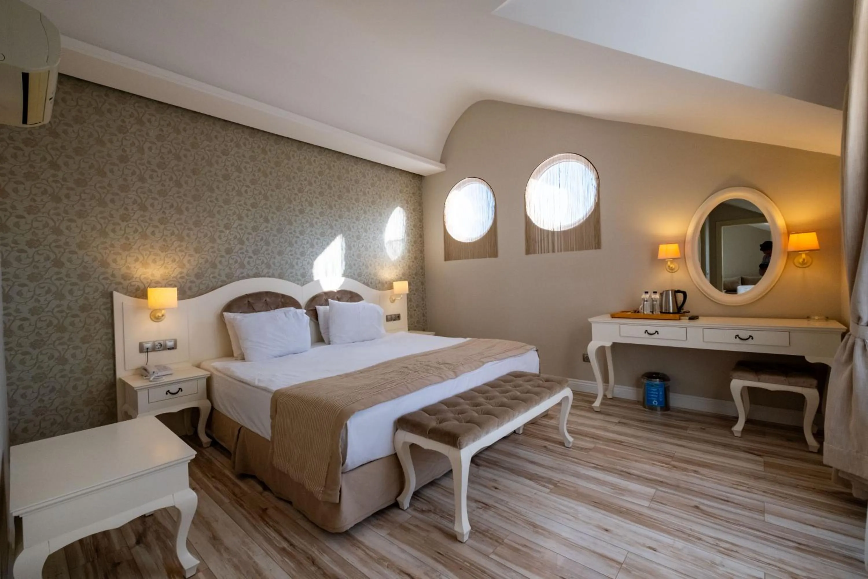 Bed in Pinehill Hotel & Suites