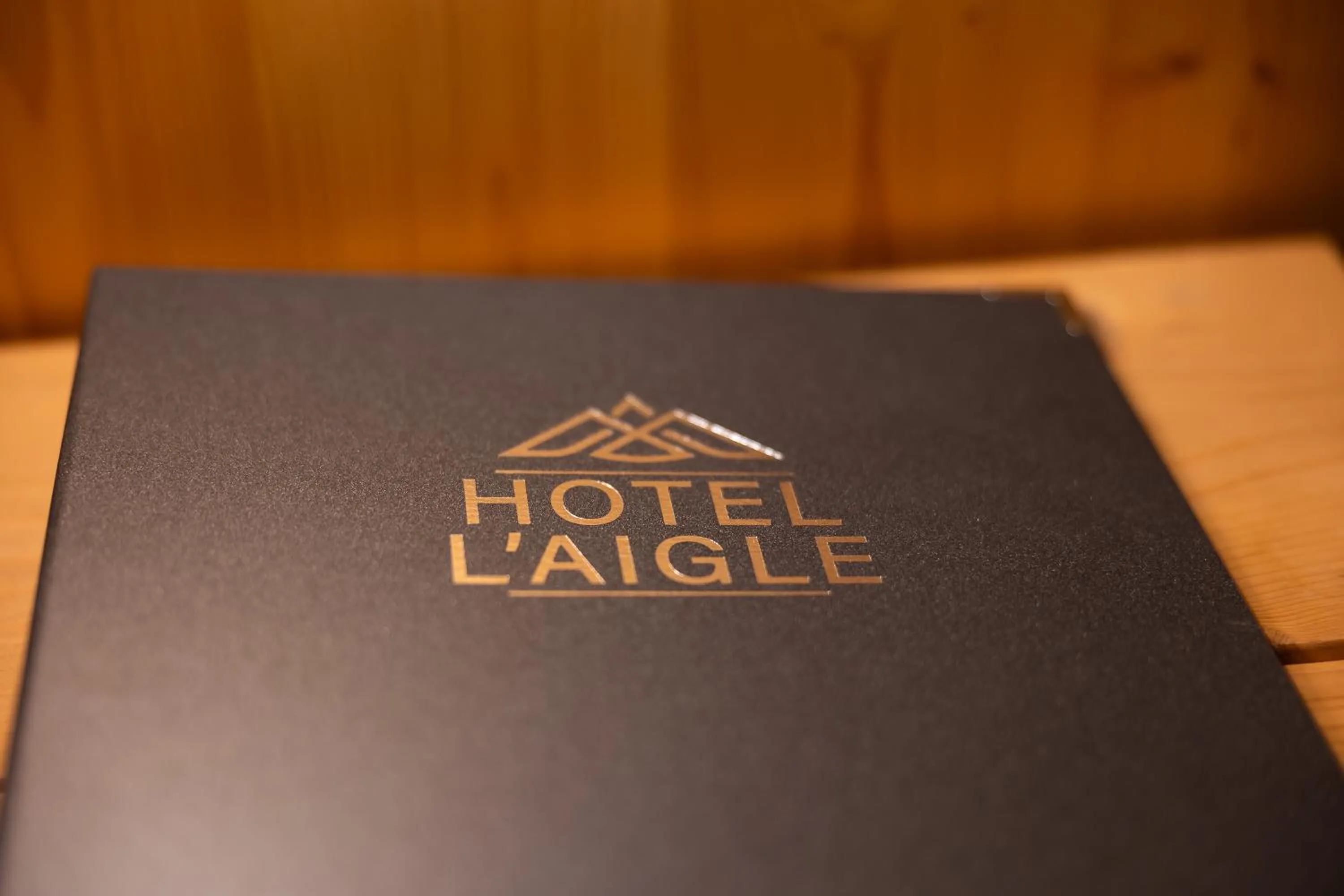 Property logo or sign in Hotel l'Aigle