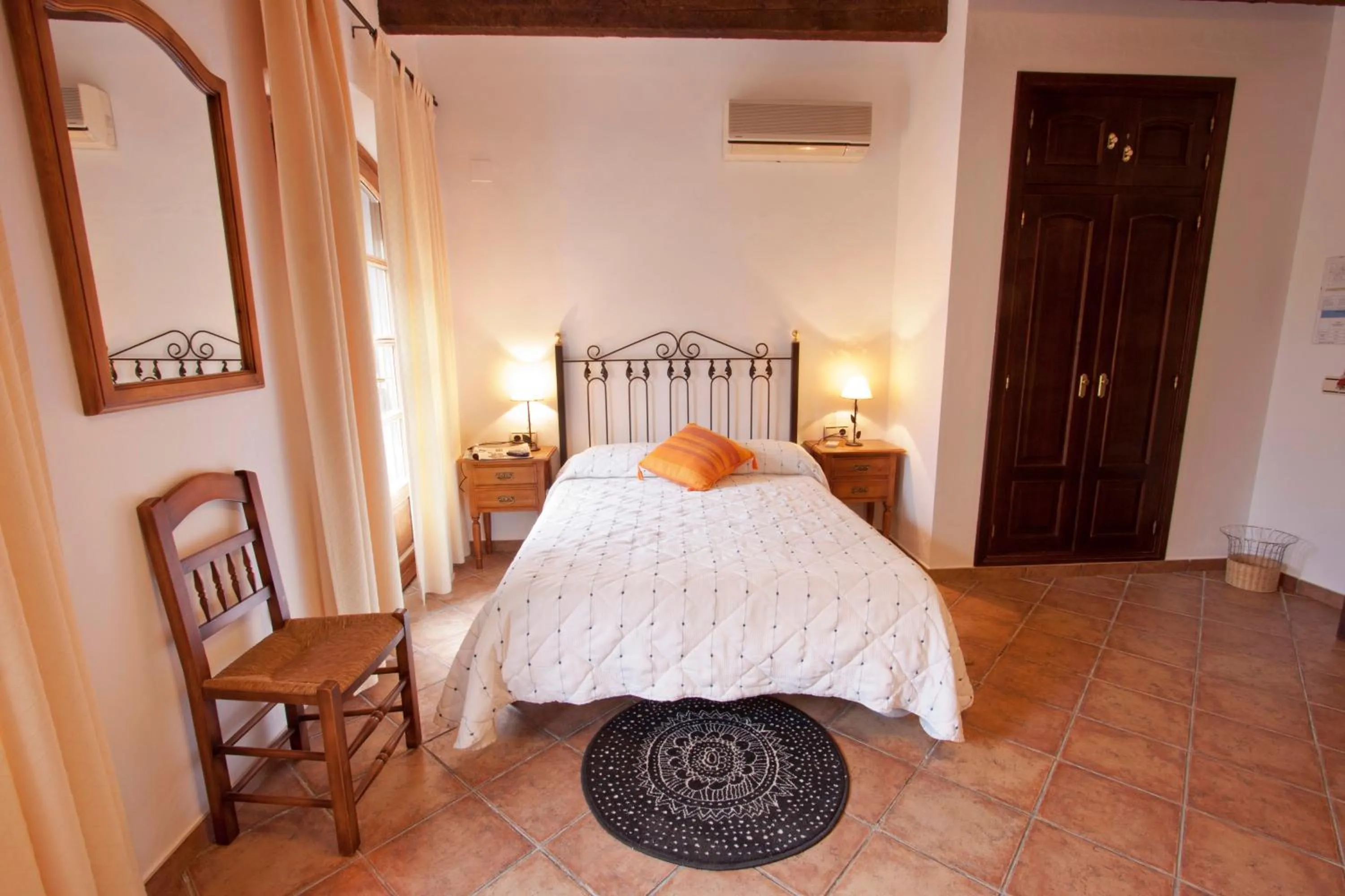 Bed in Hostal El Cortijo